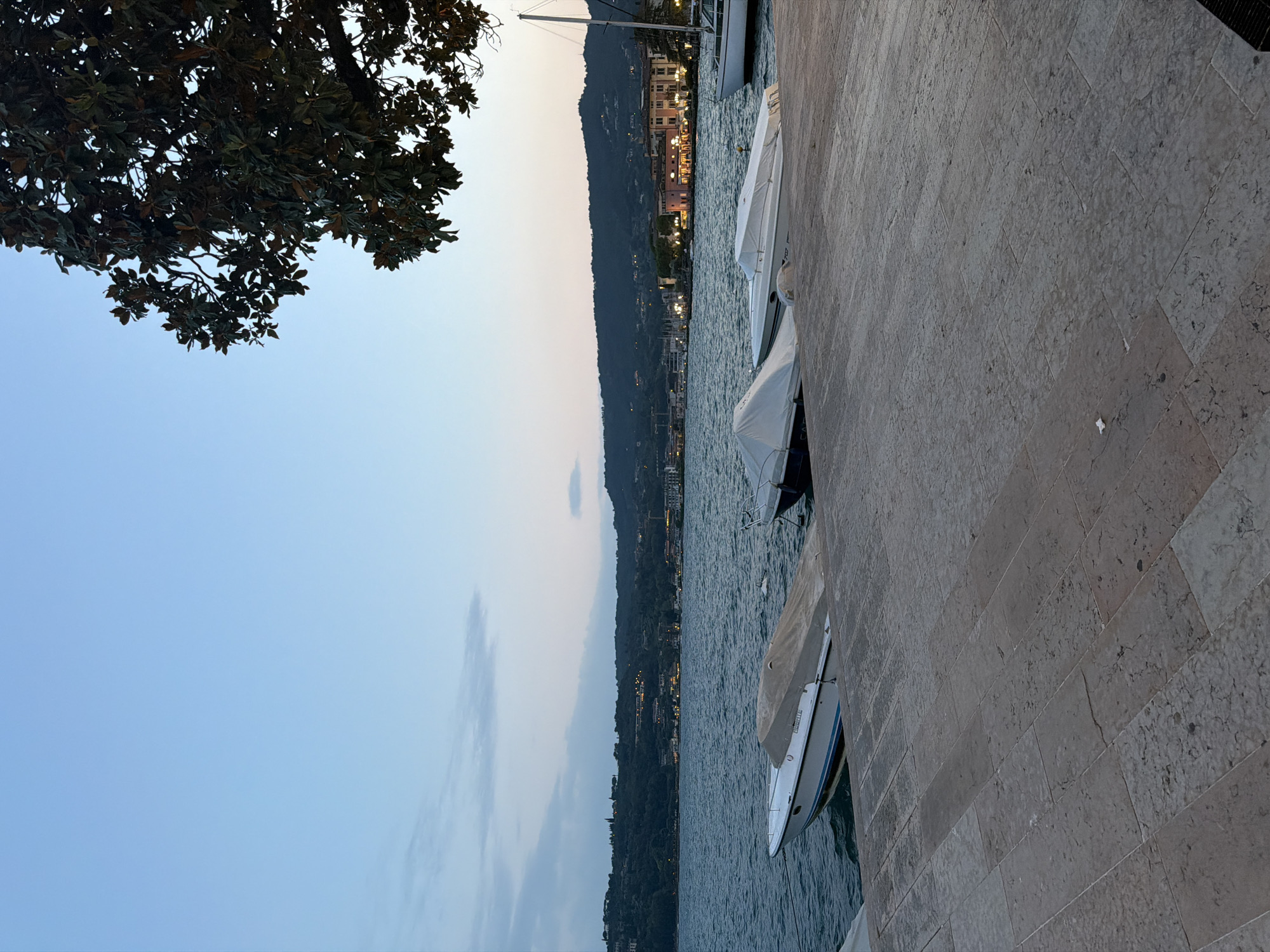 Dusk stroll along Salò's boat-lined lakefront promenade