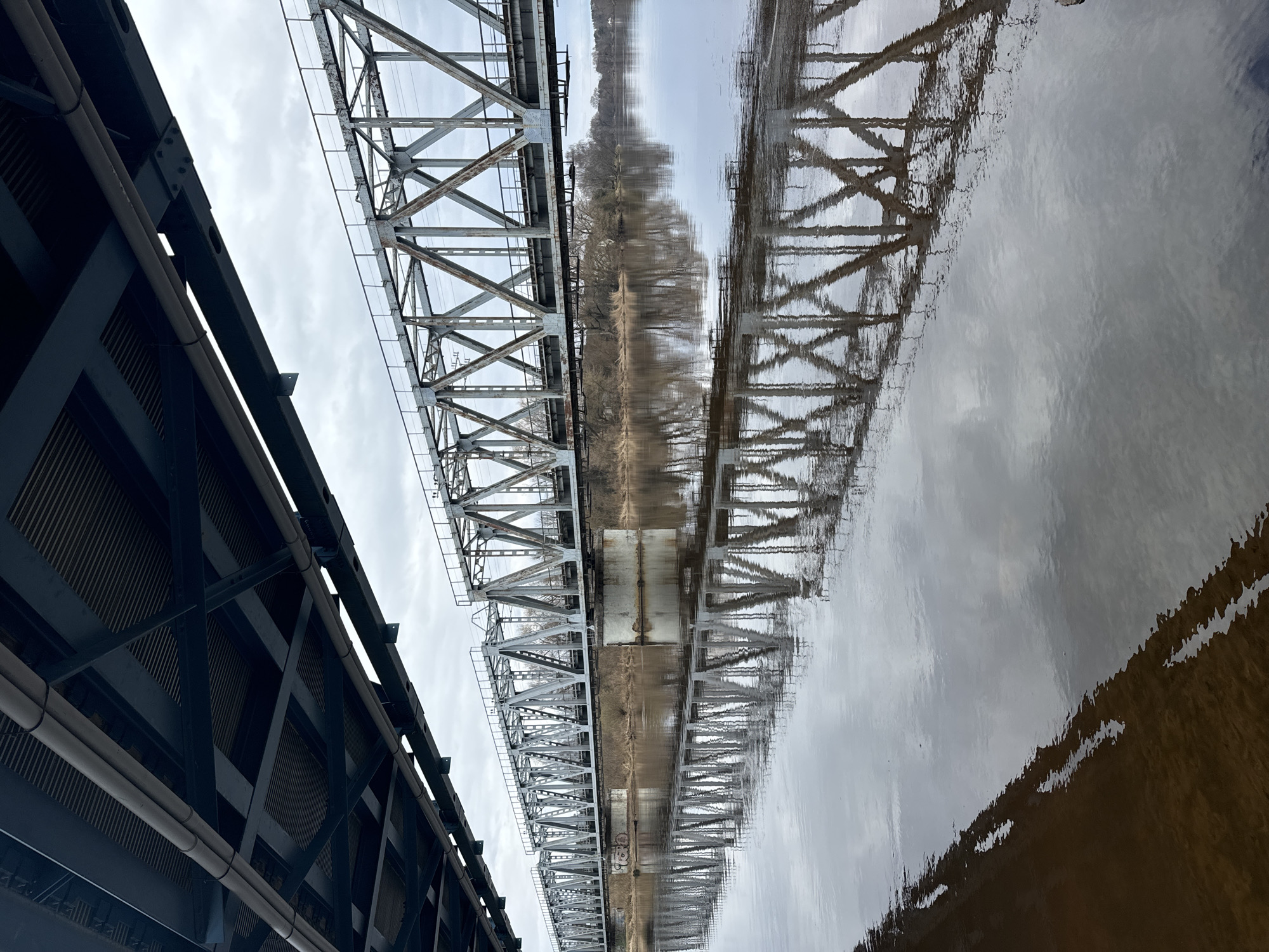 Bridge and boat scenes captured along Carnikava waterway