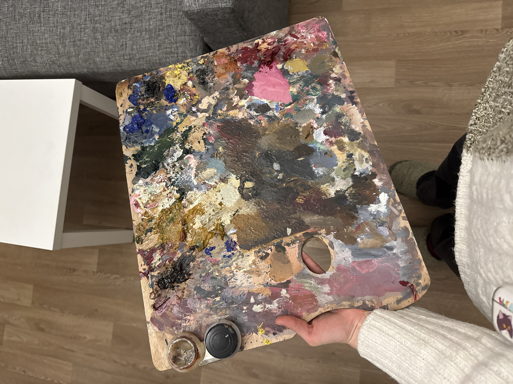 Artist's paint-laden wooden palette photographed in Moscow