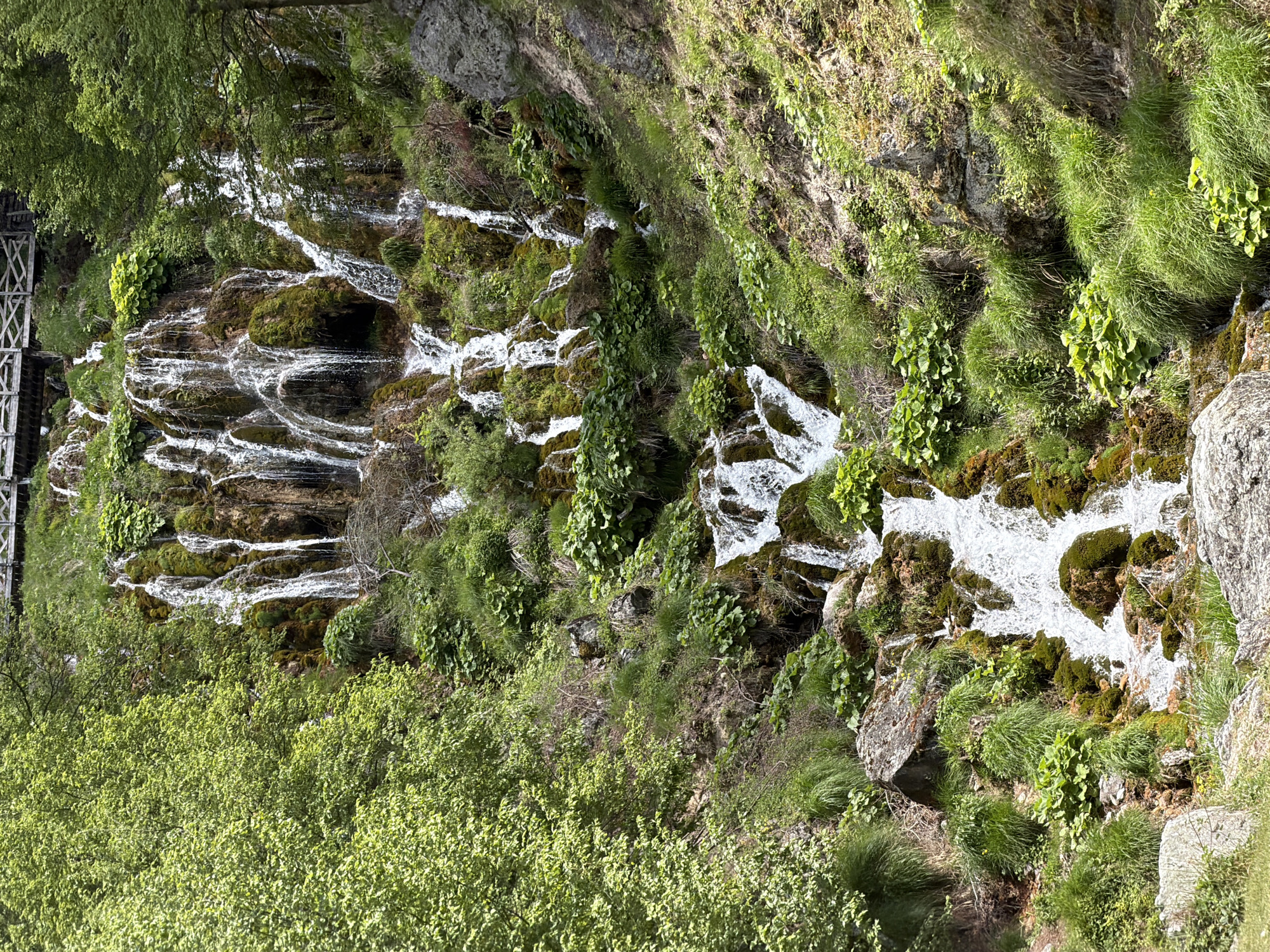 Rural waterfall and tractor scenes documented in Serbian countryside