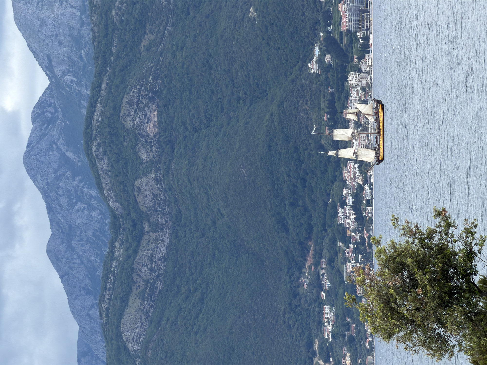 Coastal Montenegro scenes captured: landscapes, oranges, sailing boat