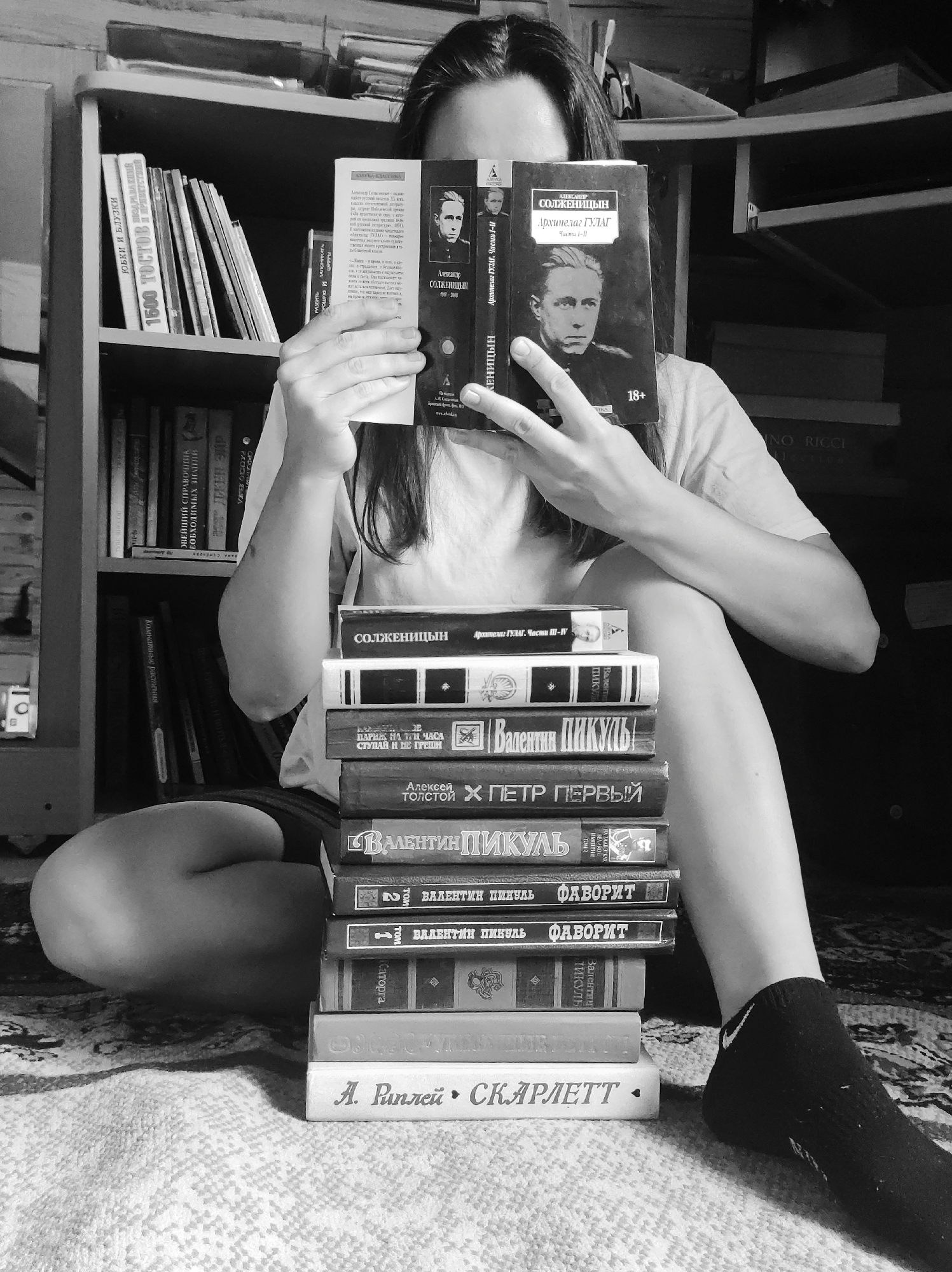 Morning reading session documented in intimate black-and-white photographs