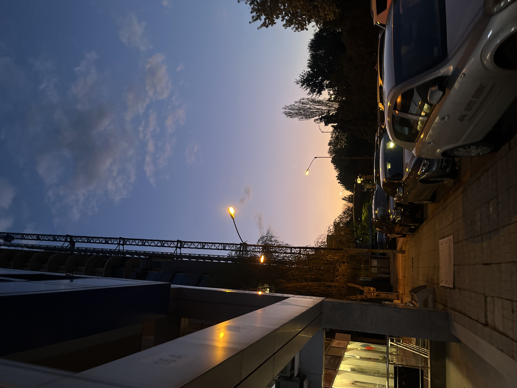 Evening street life captured around Sofia's Hotel Marinela district