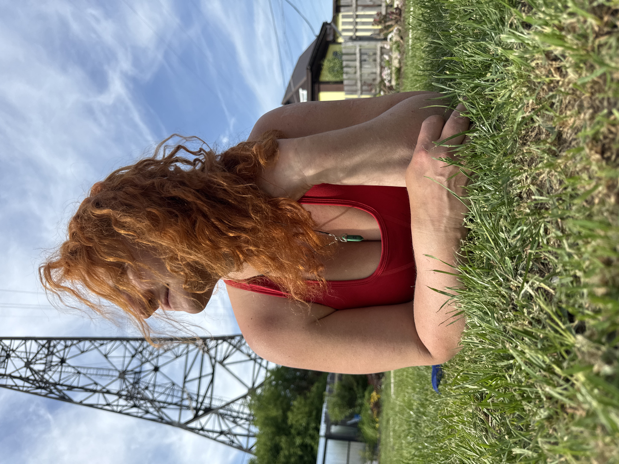 Woman enjoys outdoor afternoon with meal in Chaikovsky garden