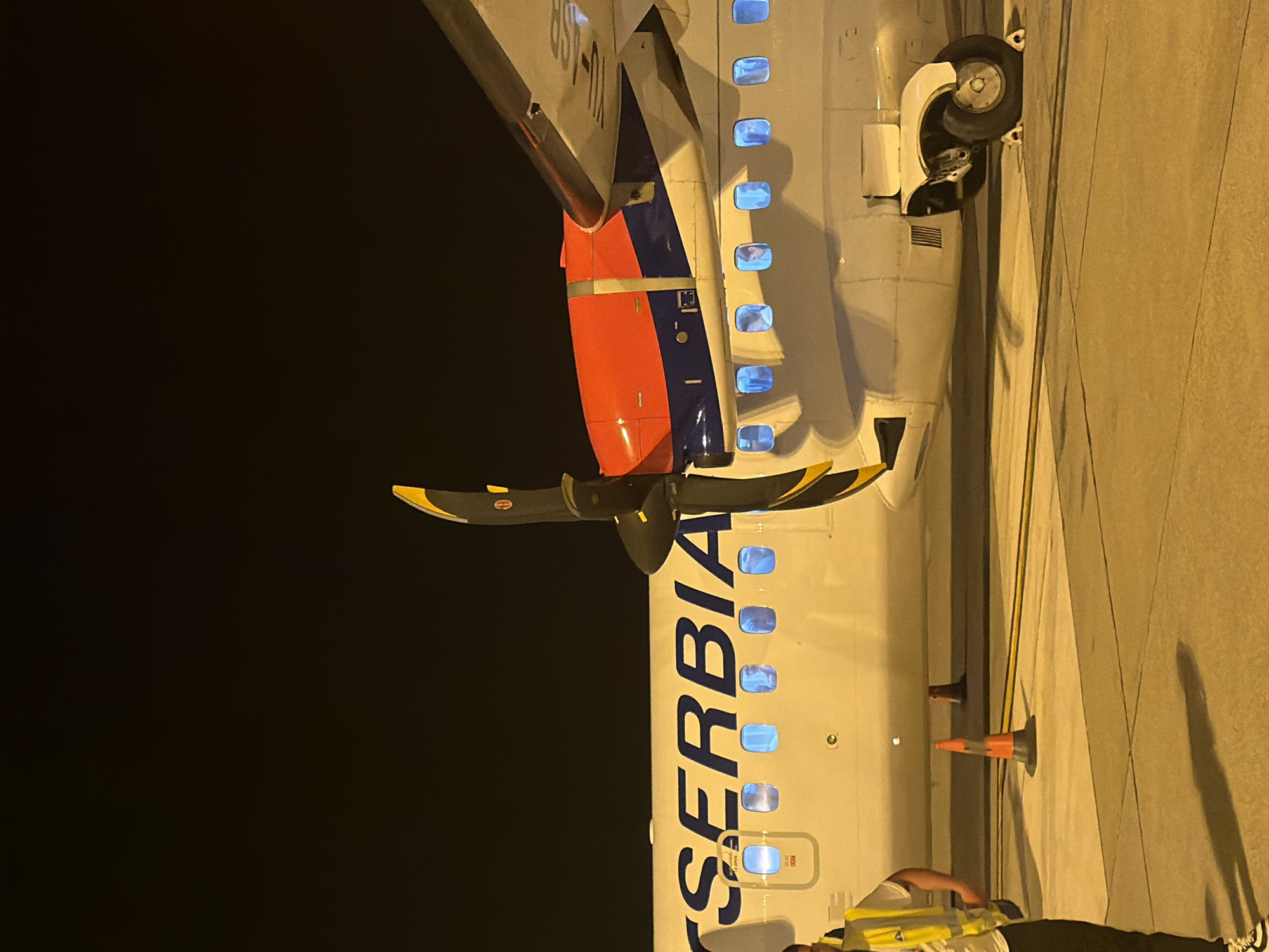 Evening flight operations documented at Podgorica Airport, Montenegro