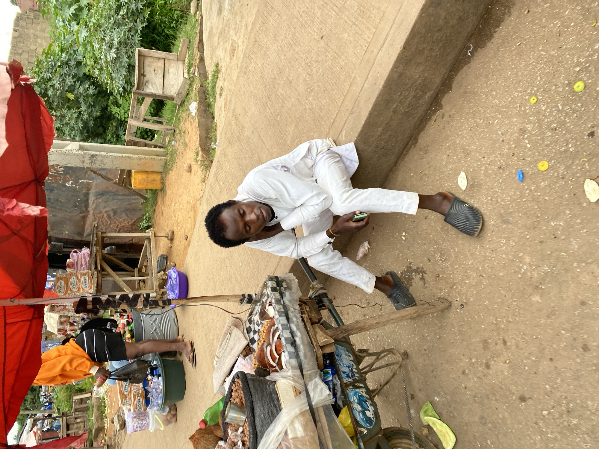 Everyday street life at a Bukuru market