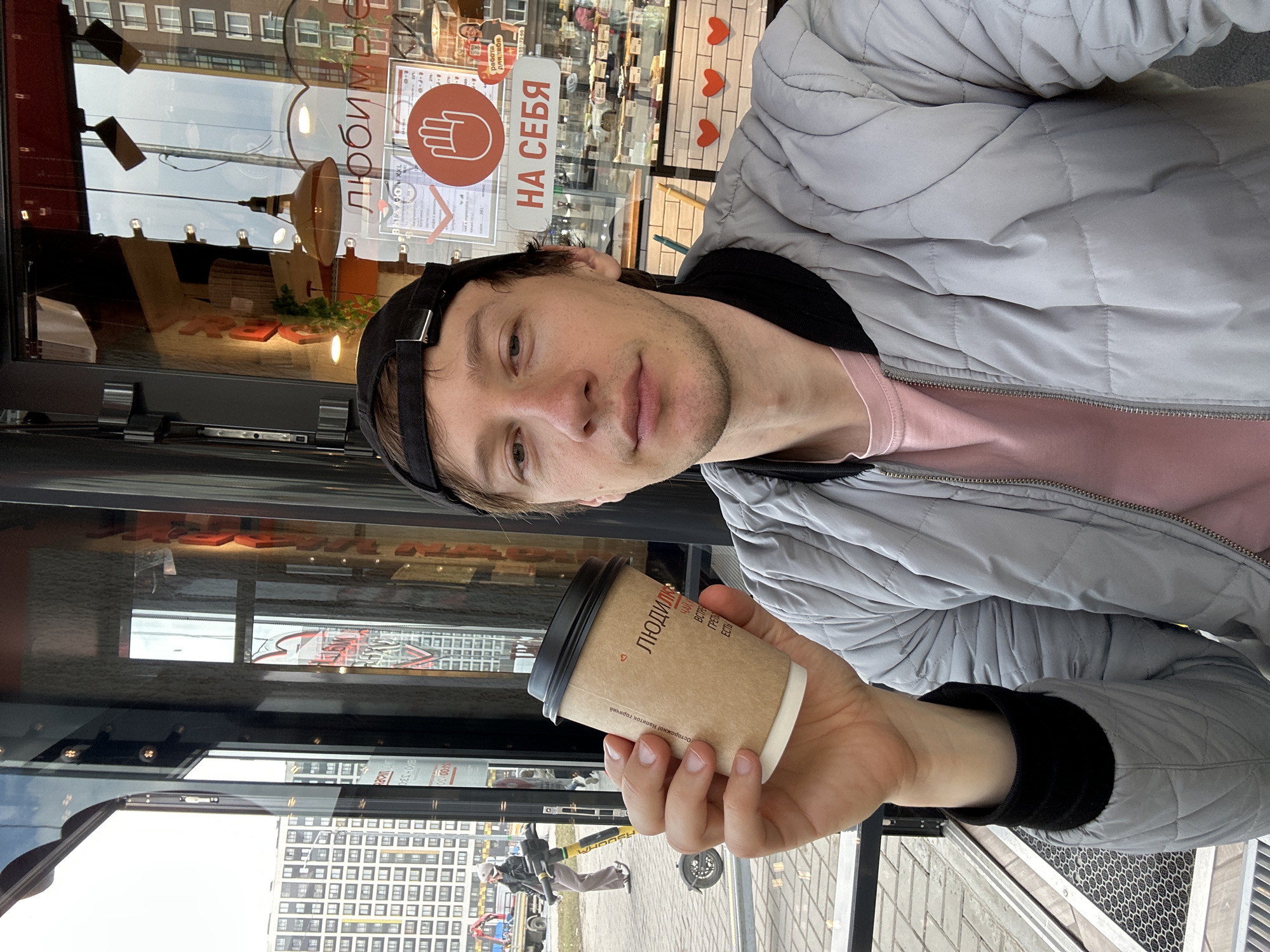 Man takes morning coffee selfie in Murino, Russia