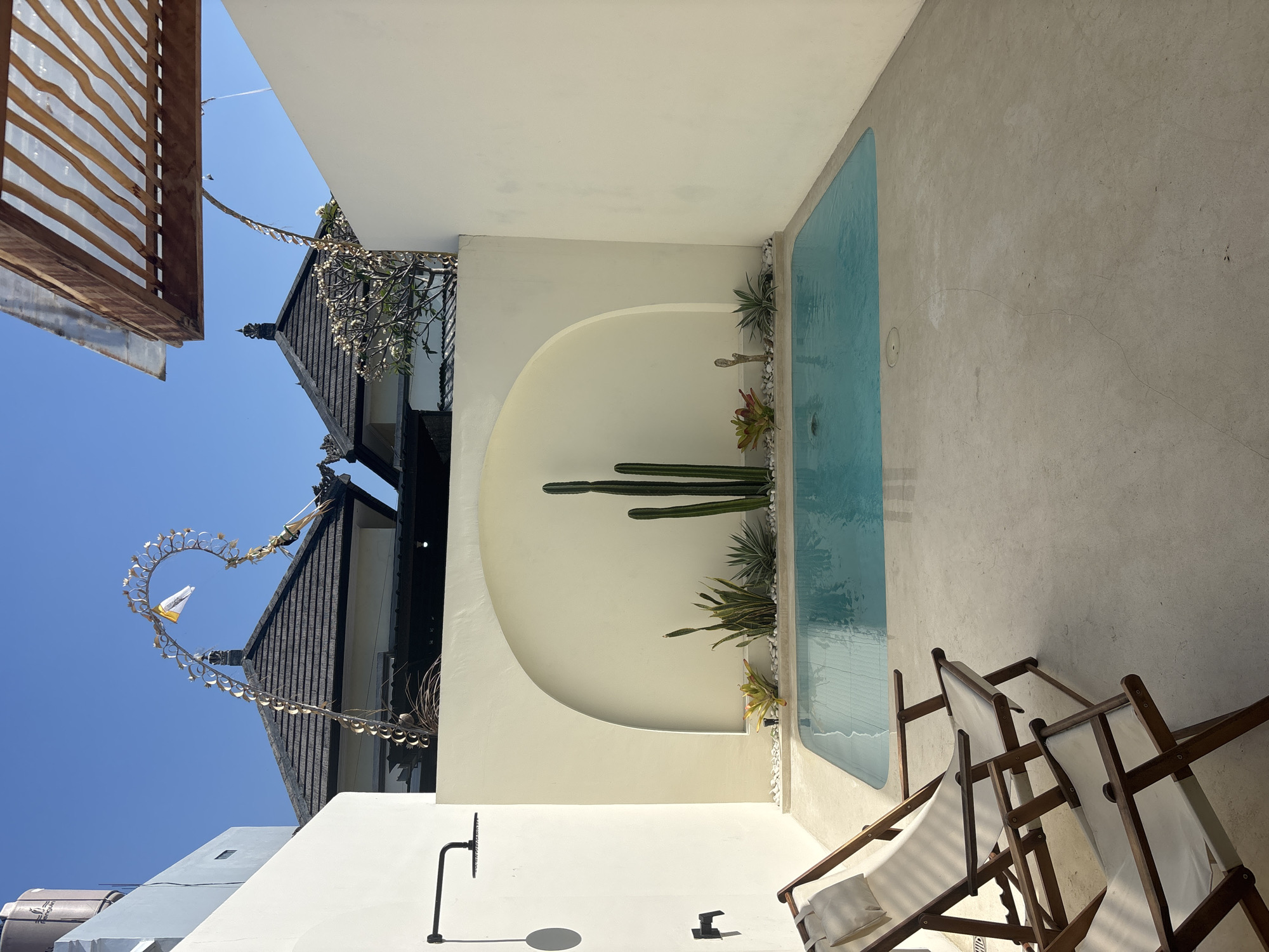 Poolside villa setting in Mengwi with minimalist interiors
