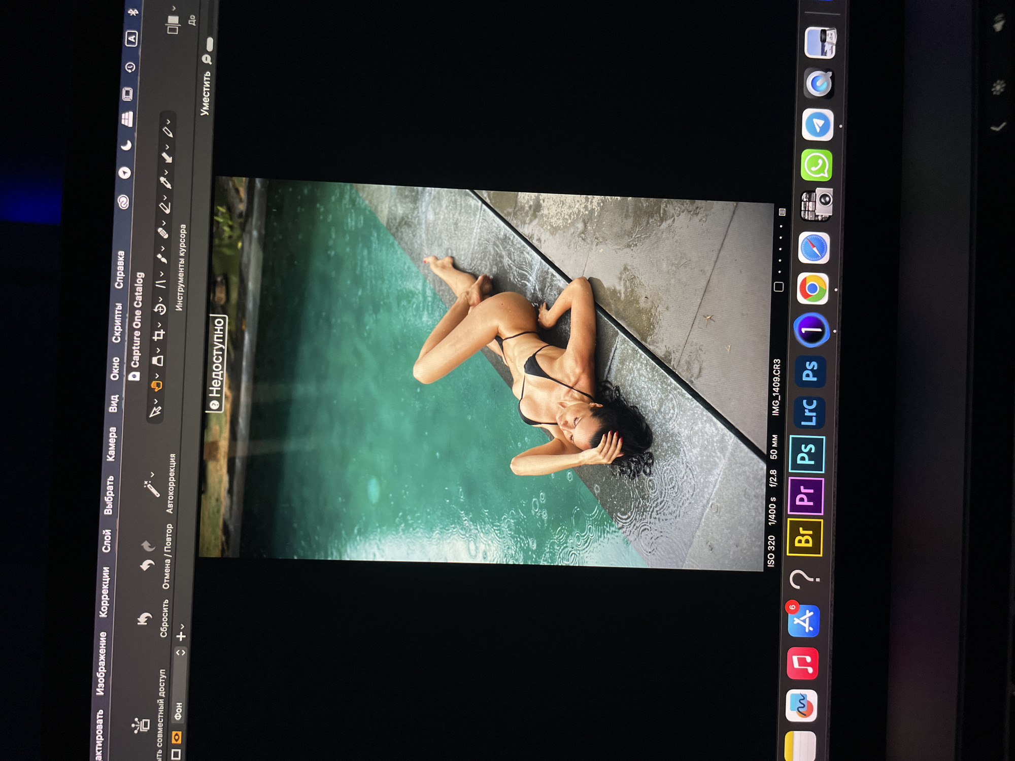 Photo editing session captured on laptop in Kazan
