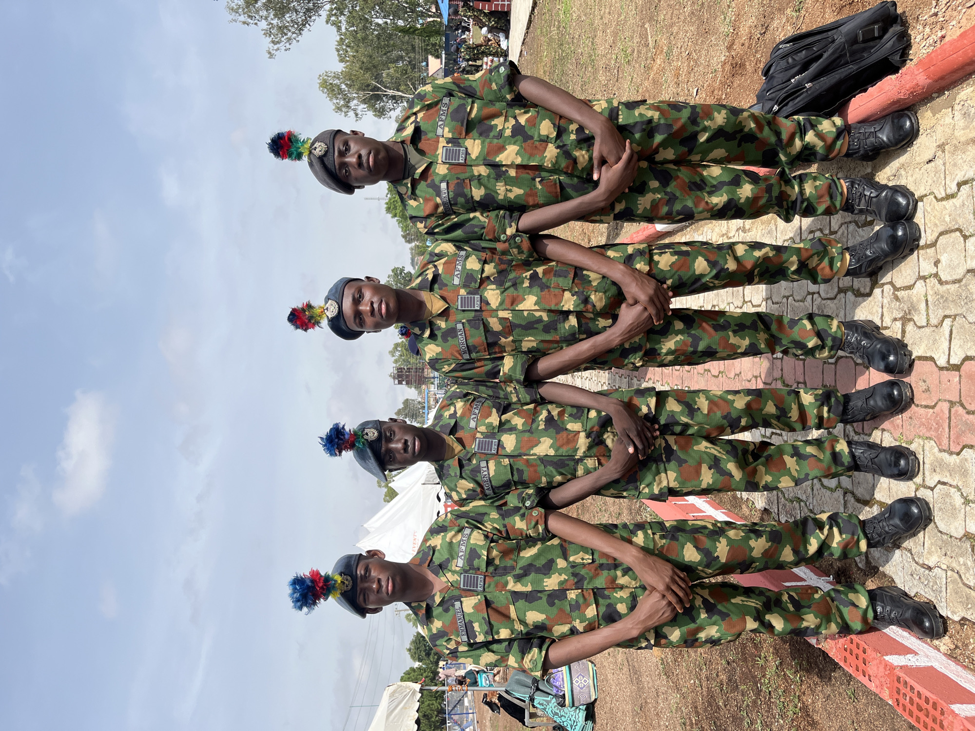 Nigerian military base event: formations, tents, and table tennis