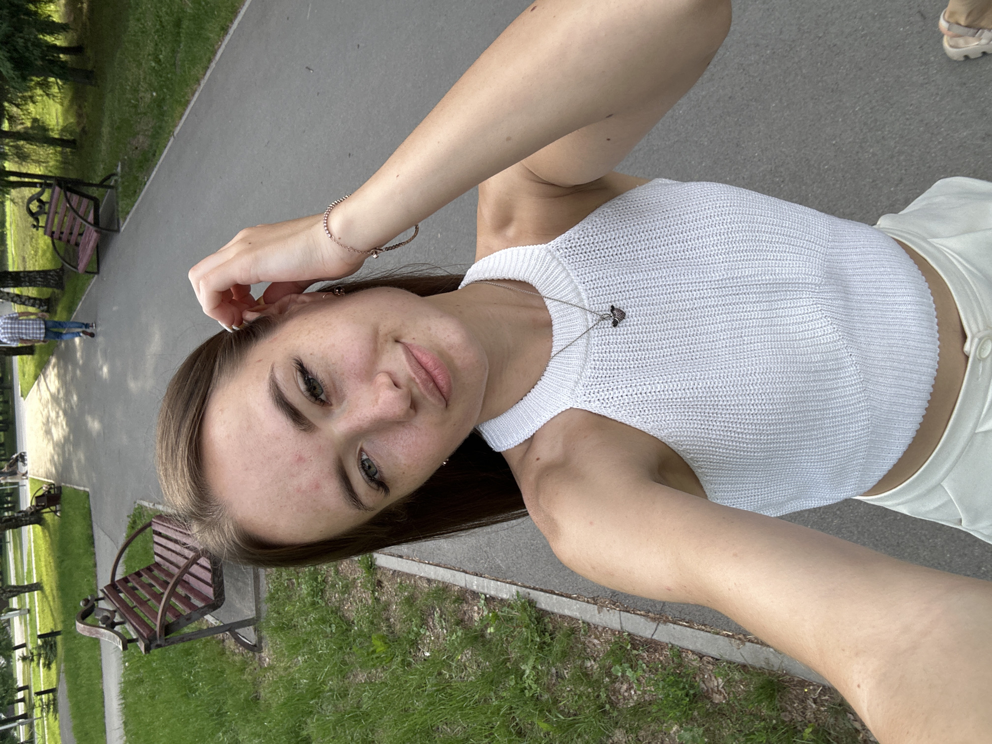 Selfie session along park pathway captured from multiple angles