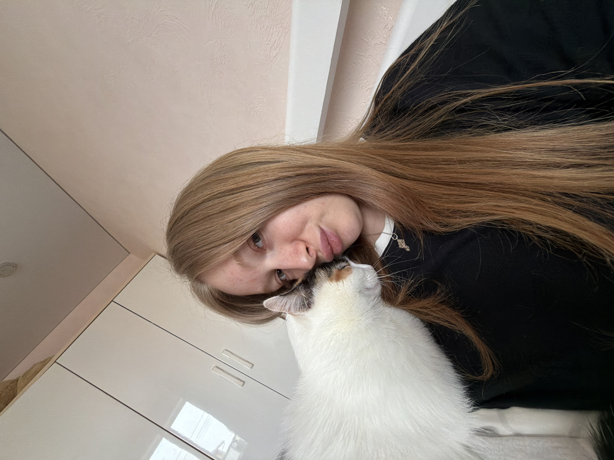 Woman spends afternoon with pets in Russian home
