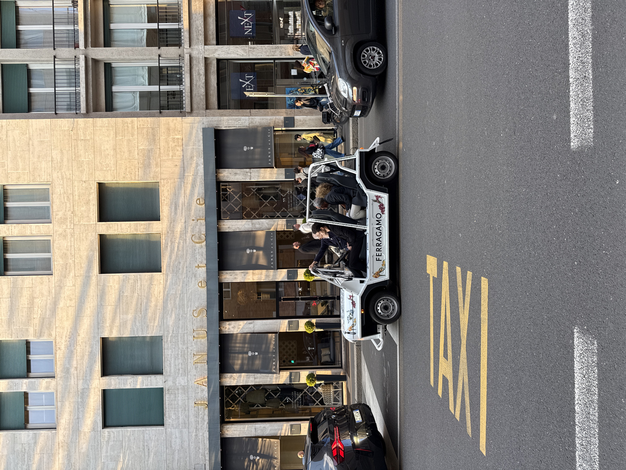 Branded vehicles spotted on Milan street during afternoon