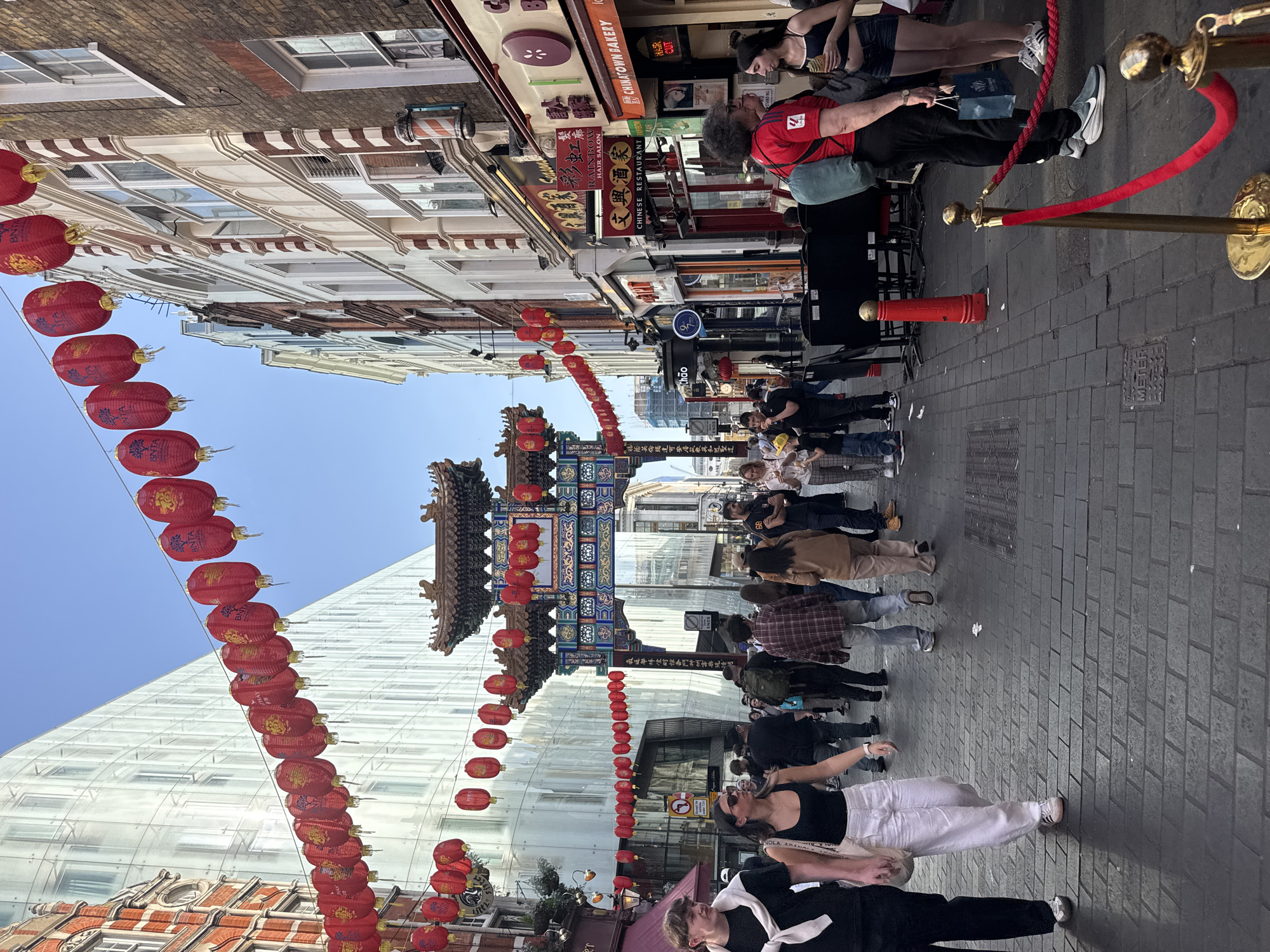 Visitor documents Chinatown street scenes with traditional decorations
