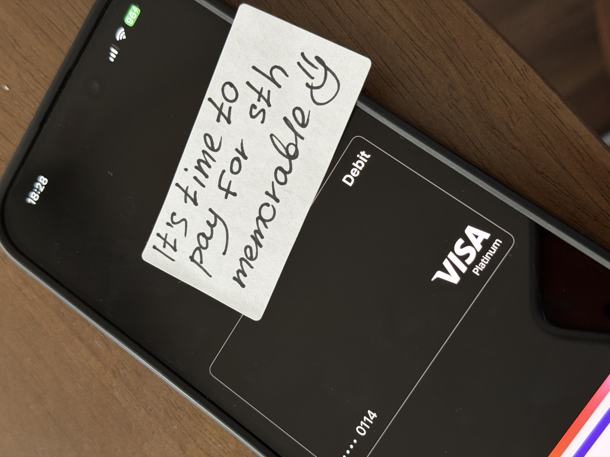 Smartphone showing digital payment interface photographed in Kiel