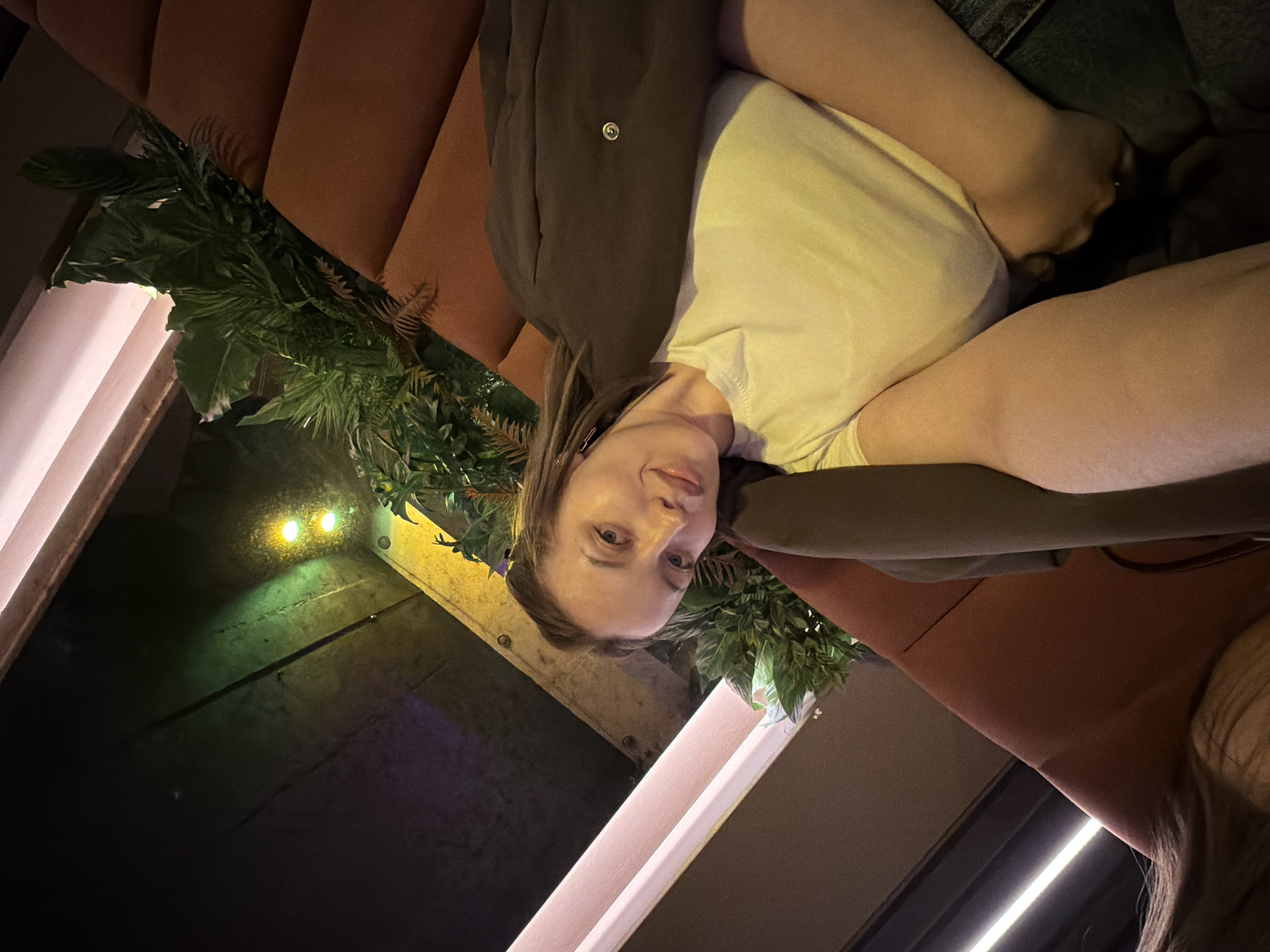 Woman takes selfies at Moscow restaurant during lunch hour