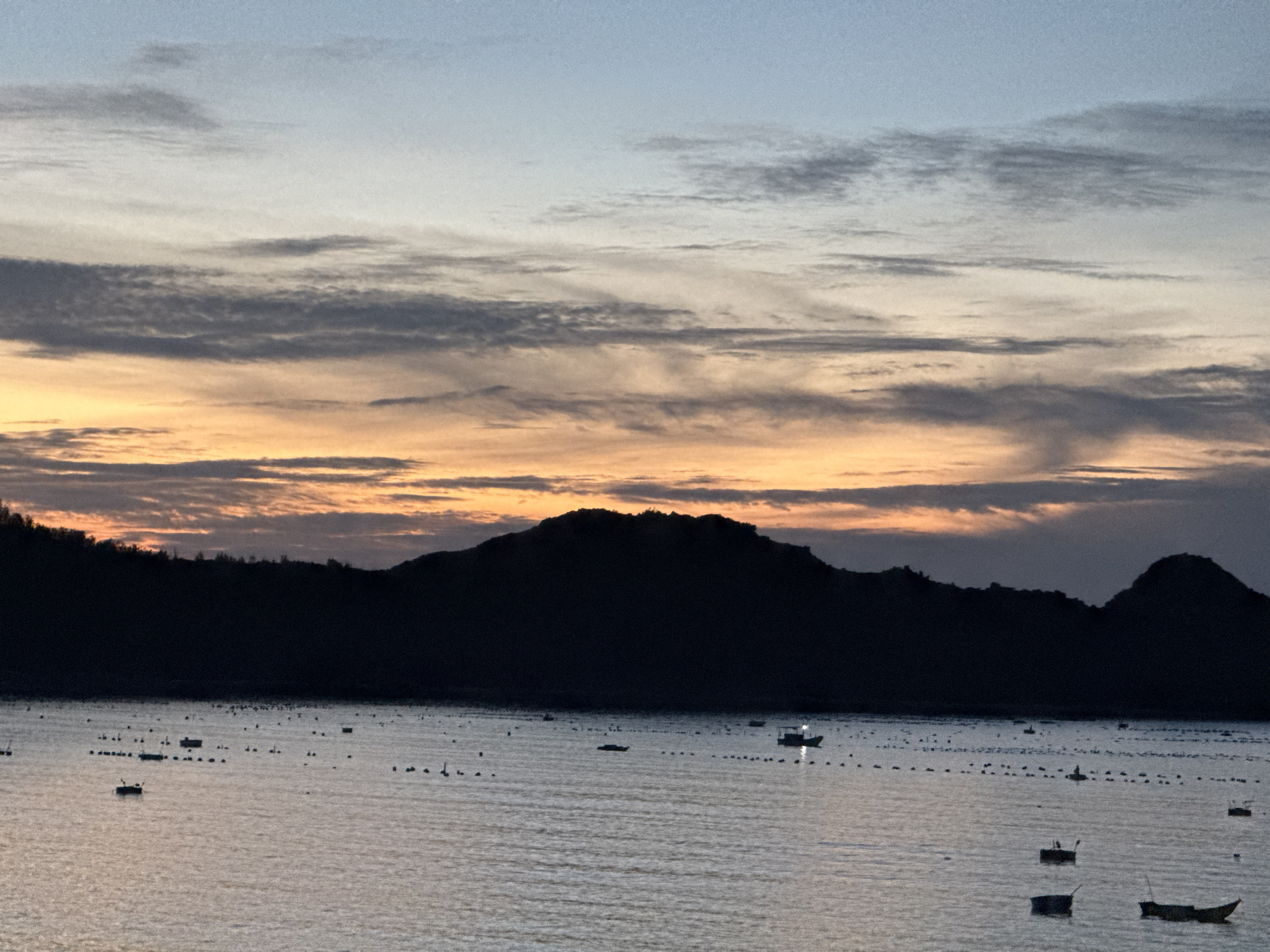 Sunset to twilight over Song Cau beach, Vietnam