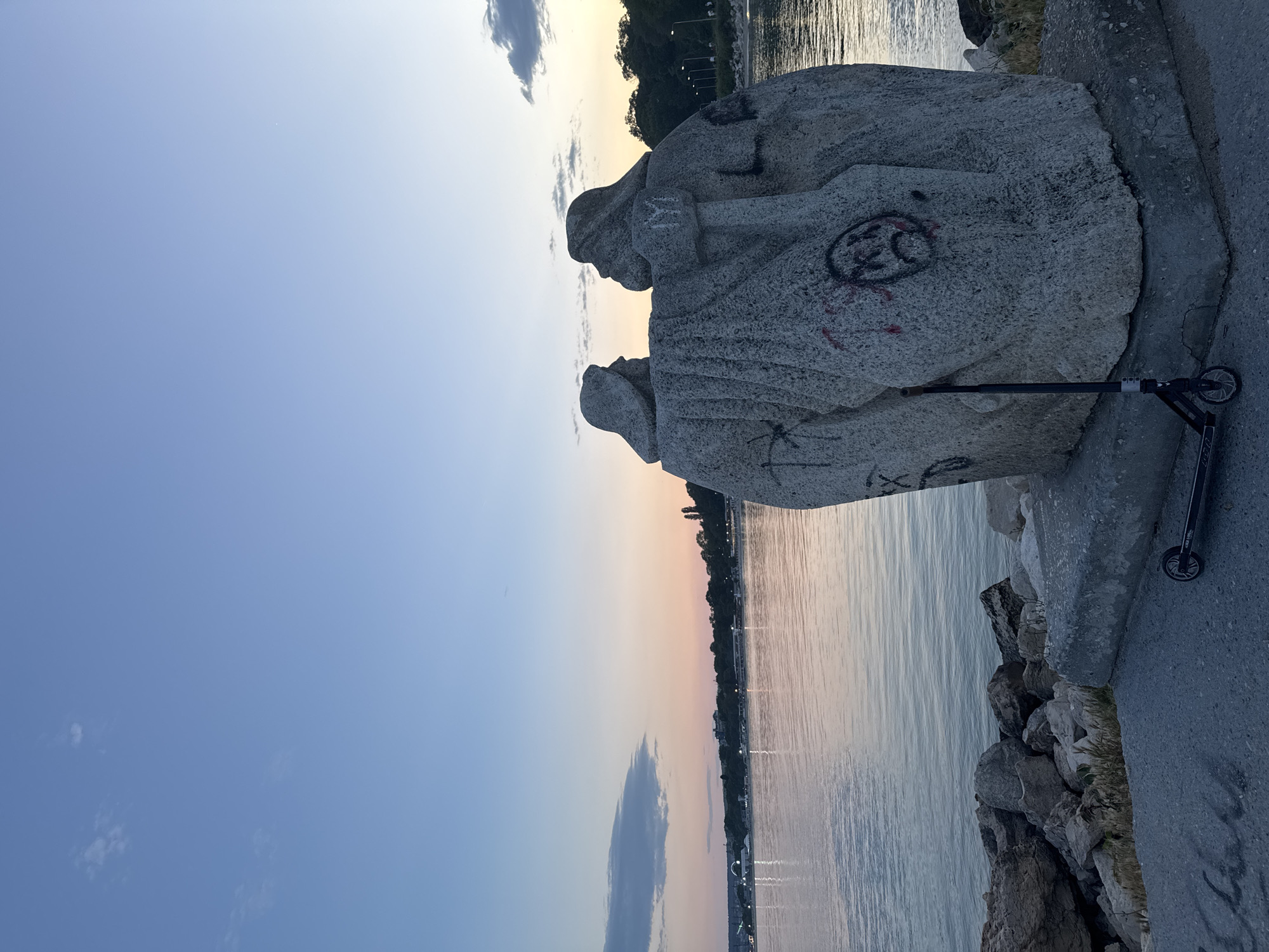 Twilight waterfront scene documented by witnesses during evening hours