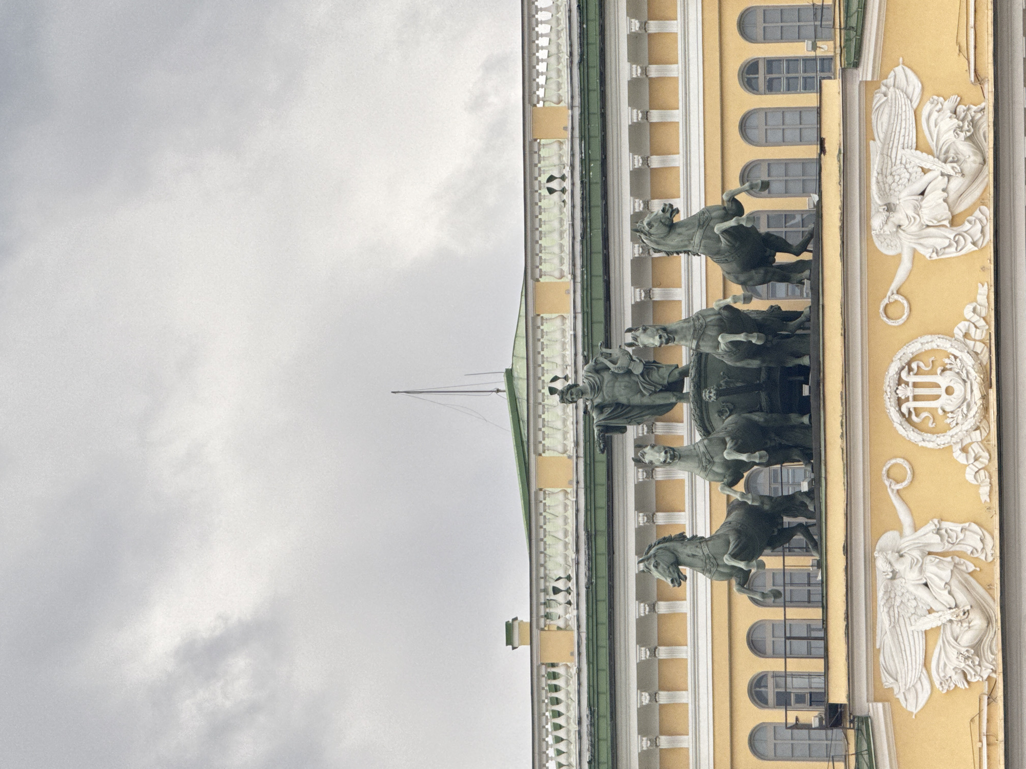 Tourist documents Saint Petersburg landmarks during afternoon walking tour