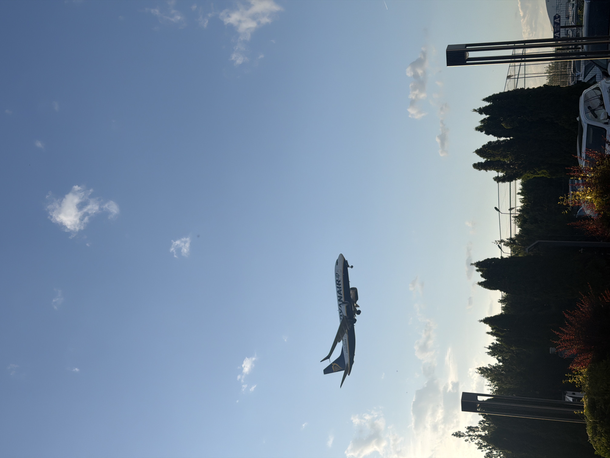 Aircraft land at Otopeni Airport during sunset hours