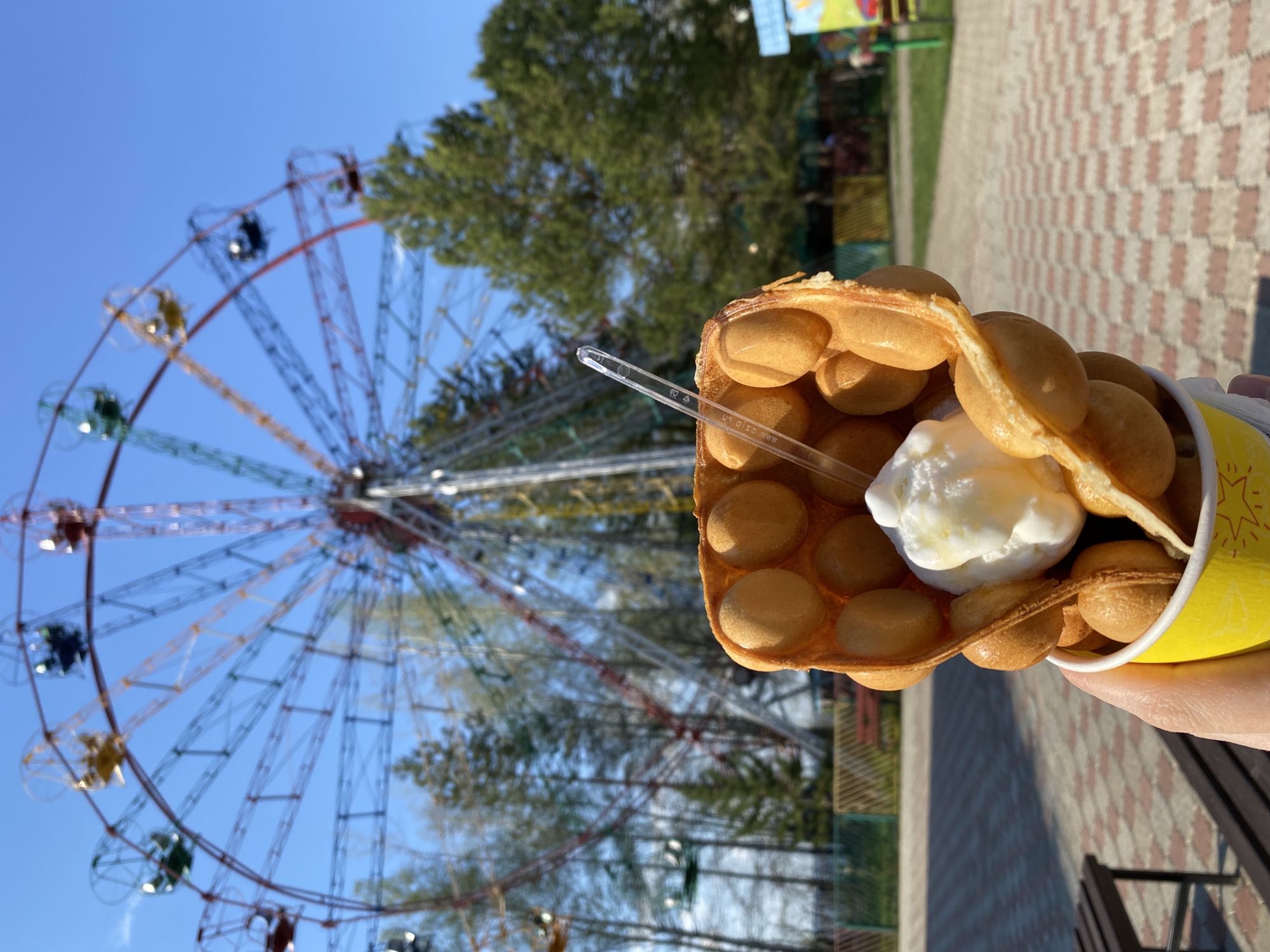 Family enjoys spring afternoon at Chaikovsky park with rides, monuments