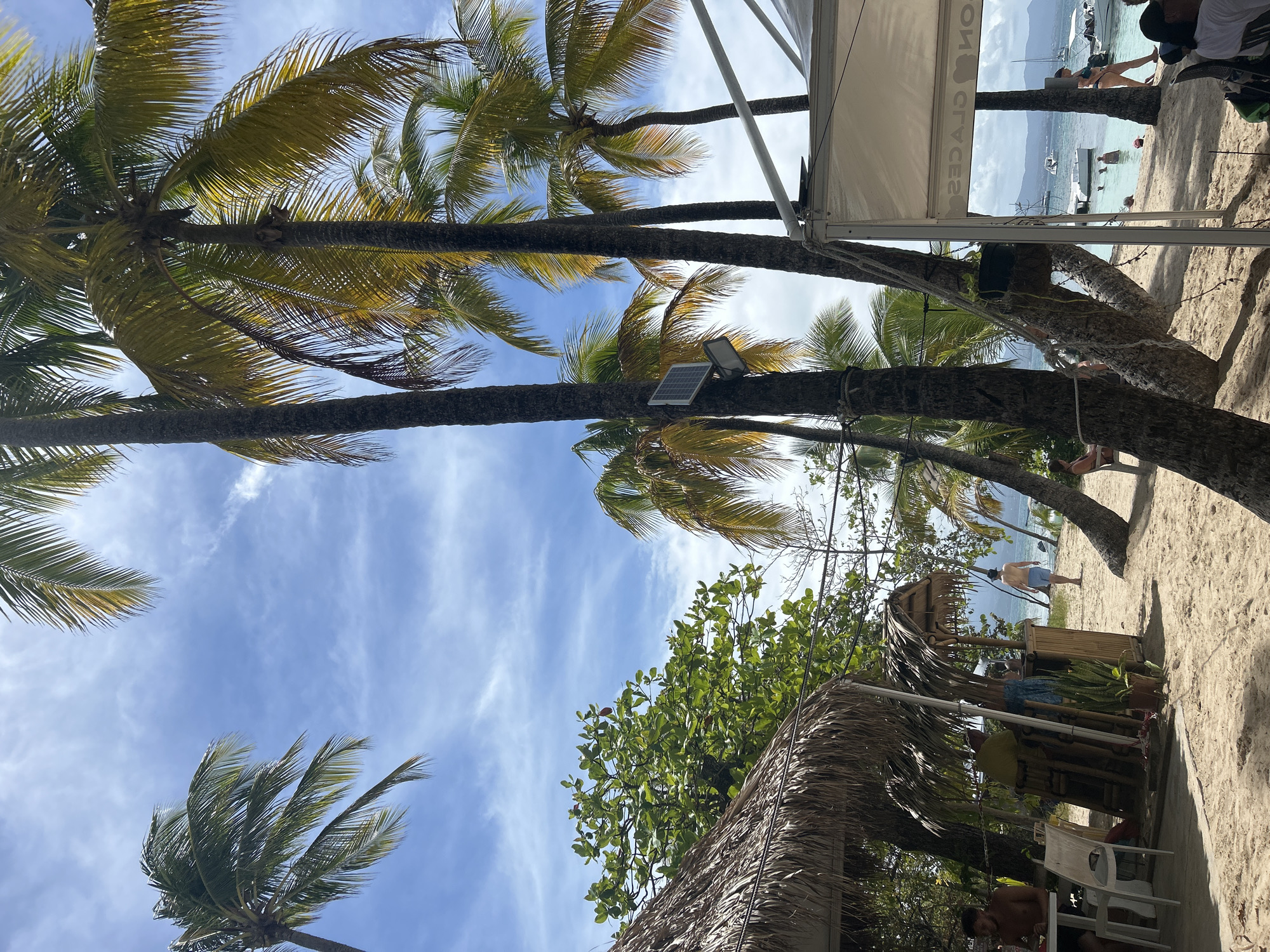 Beachfront dining documented in Le Gosier, France