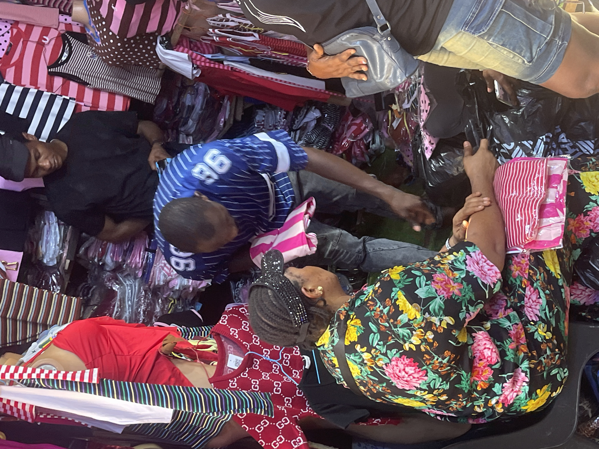Busy outdoor marketplace draws shoppers and vendors Tuesday afternoon