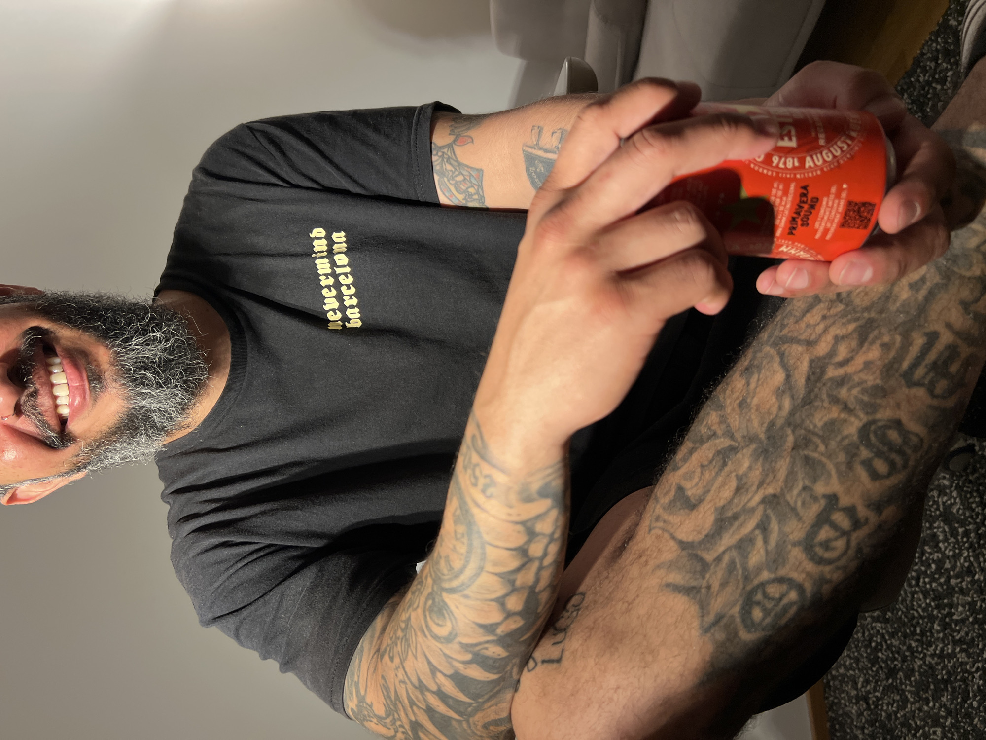Festival-goer enjoys branded soda in L'Hospitalet de Llobregat