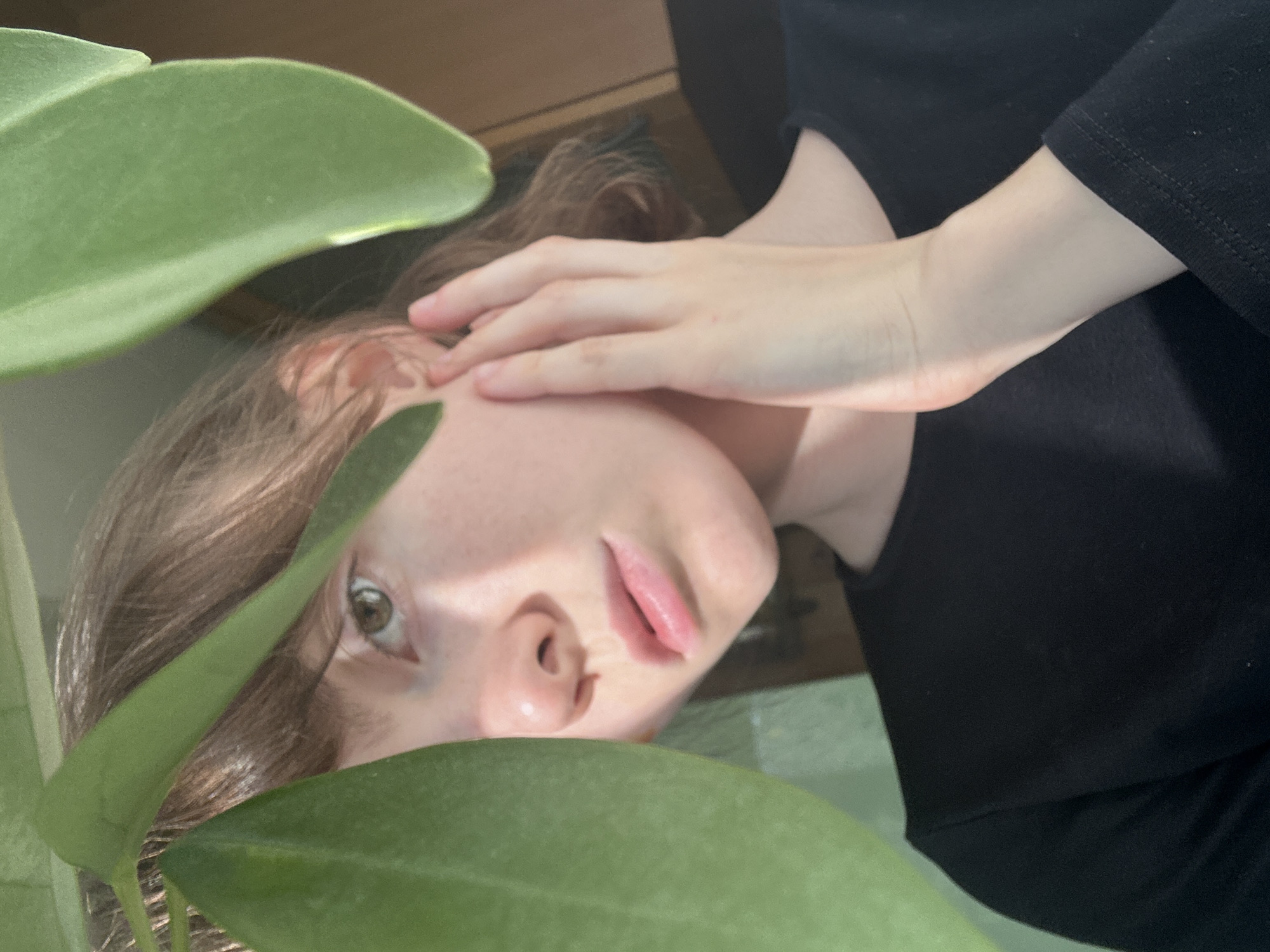 Contemplative moment captured among spring foliage in Moscow