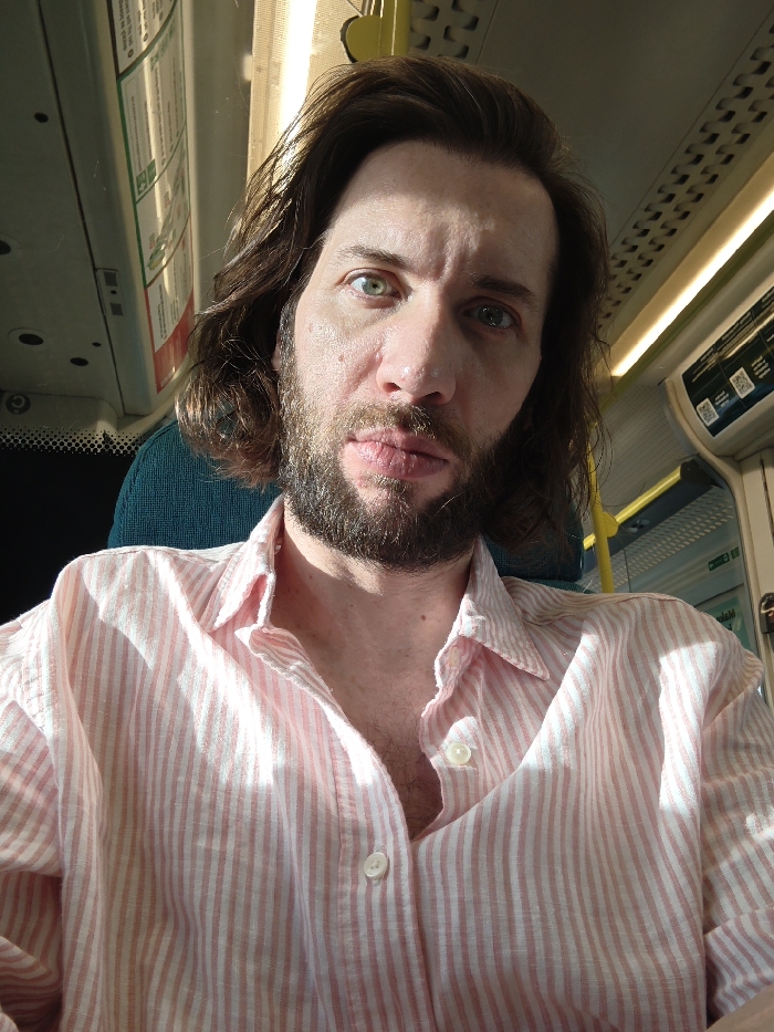 Bearded passenger spotted on London train carriage