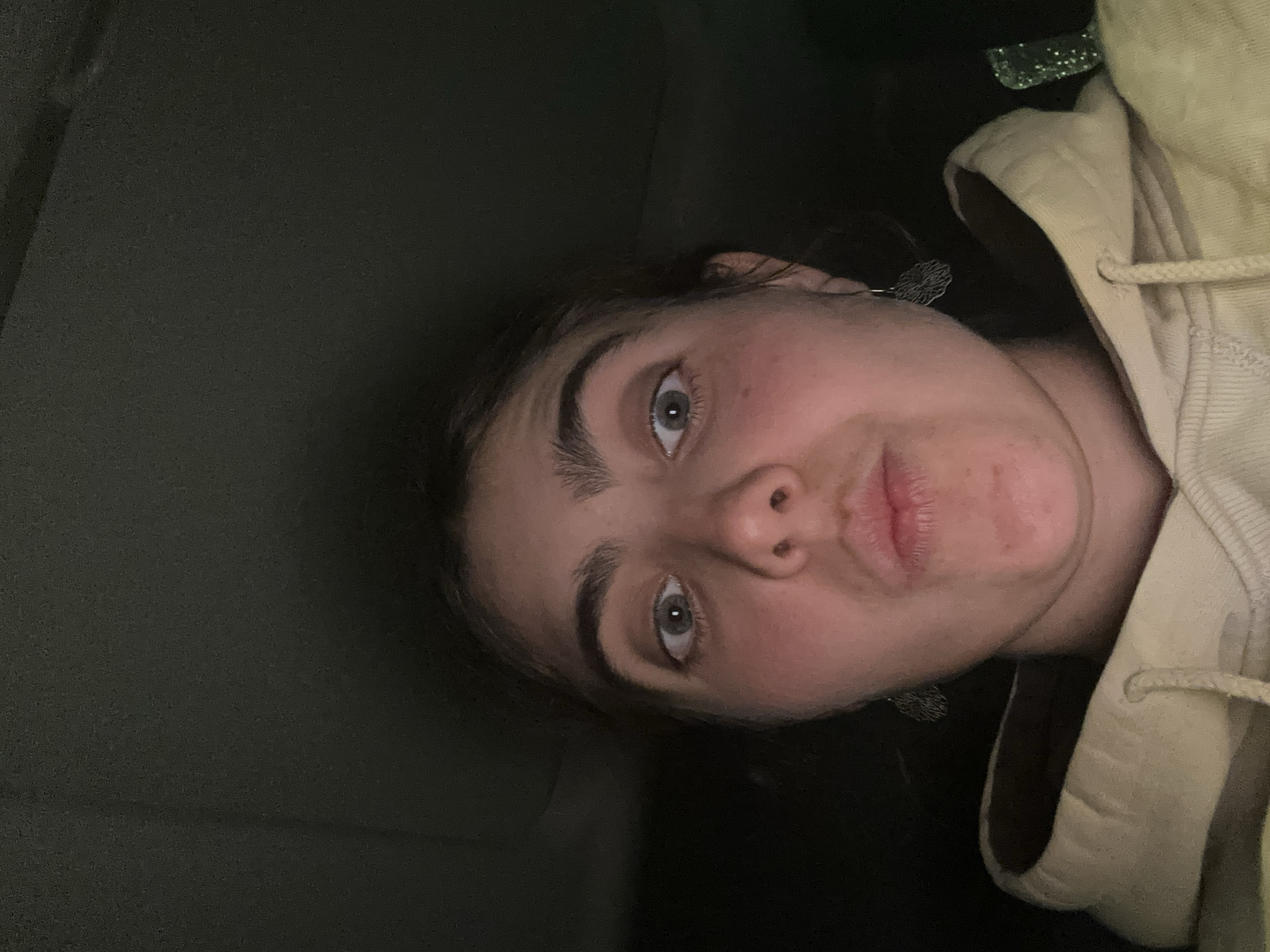 Woman takes late-night selfie in Neot Hovav, Israel