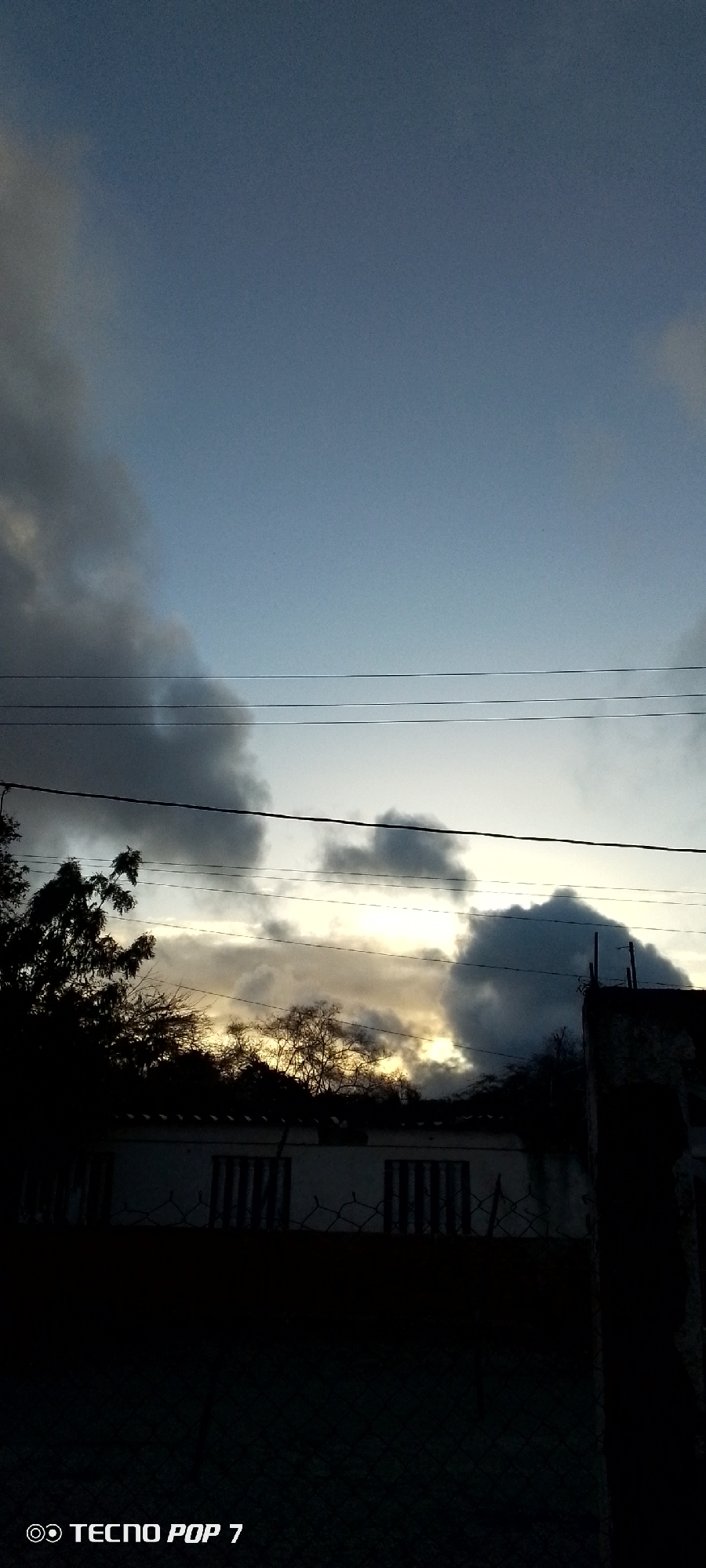 Venezuelan resident documents changing skies over Altagracia neighborhood
