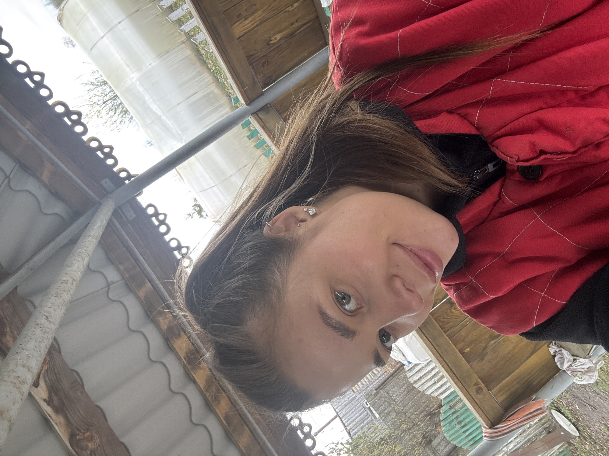 Woman takes outdoor selfie in Сульмаш, Russia