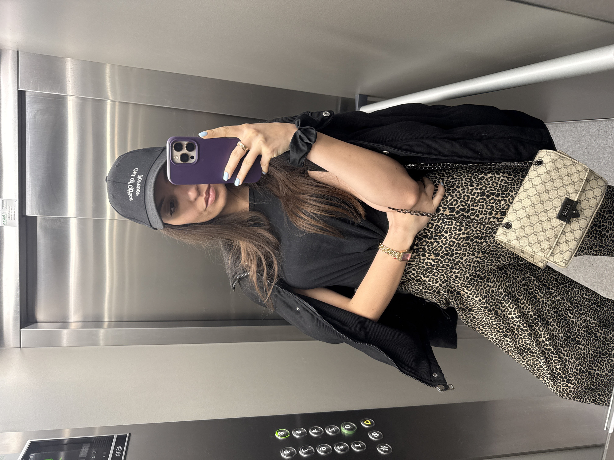 Woman takes selfie in elevator in Plovdiv