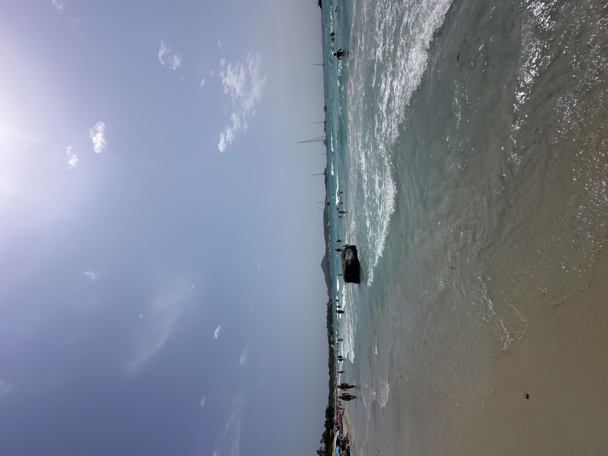 Crowded beach day at Villasimius with granita vendor on site