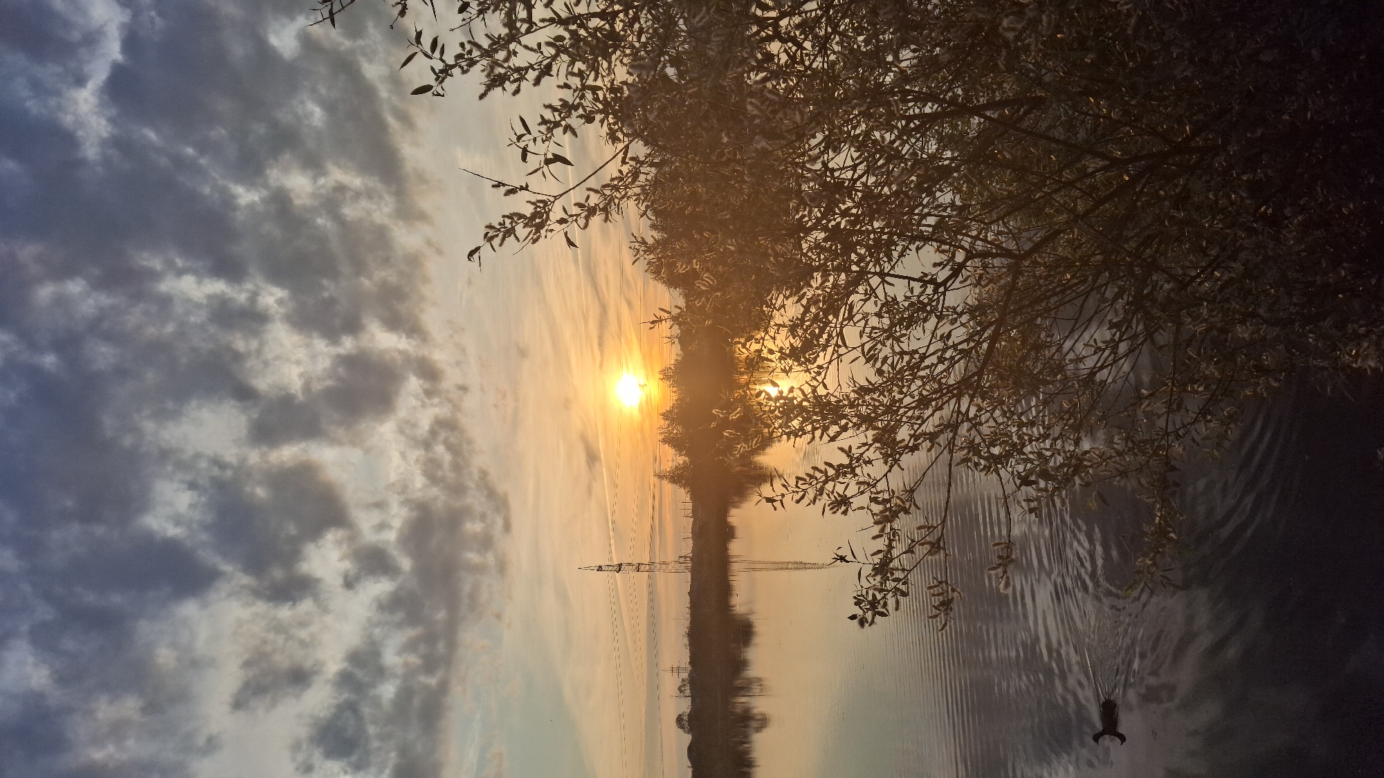 Family enjoys golden hour lakeside outing in Innolovo, Russia