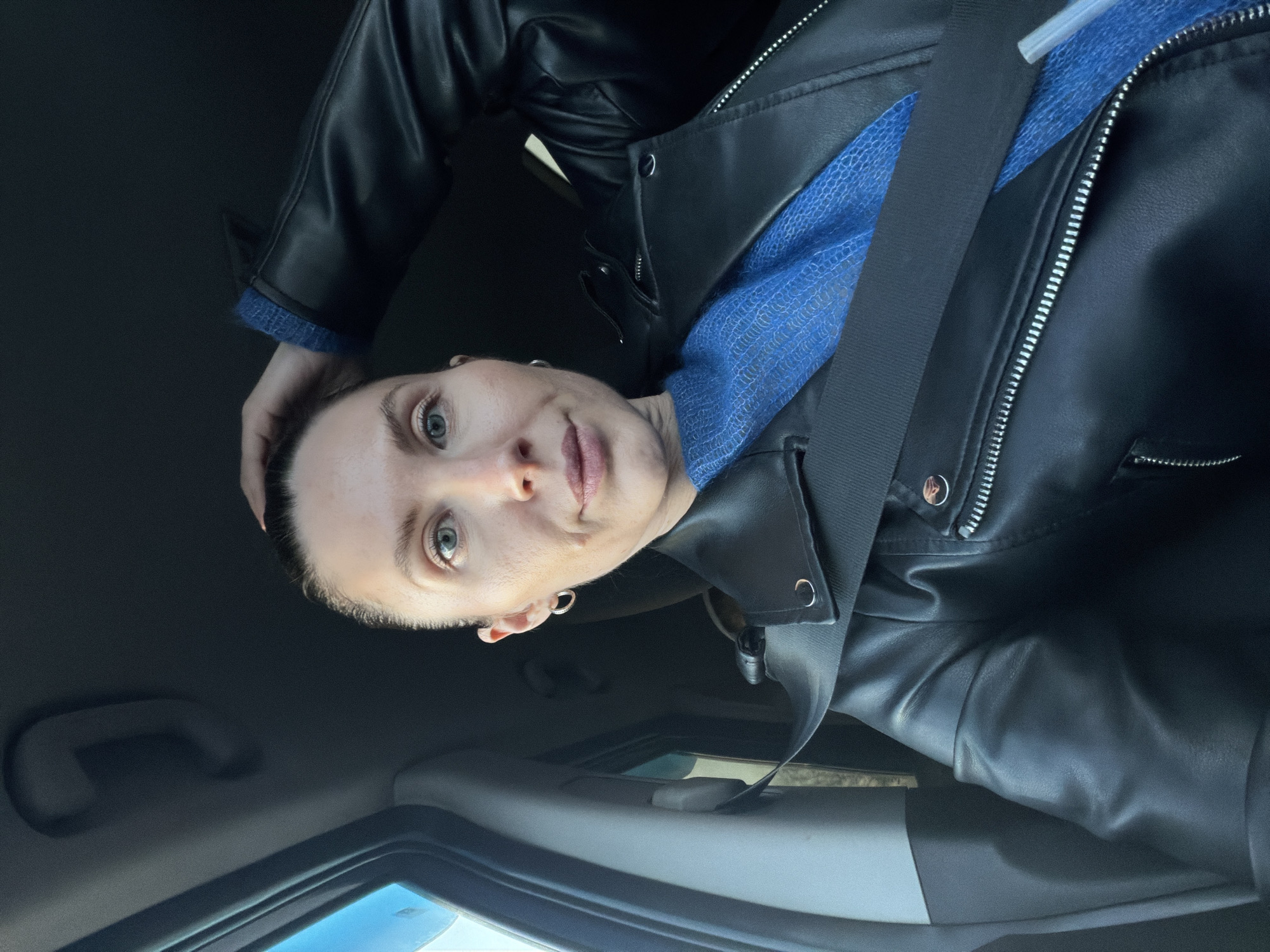 Woman takes car selfie in Perm, Russia