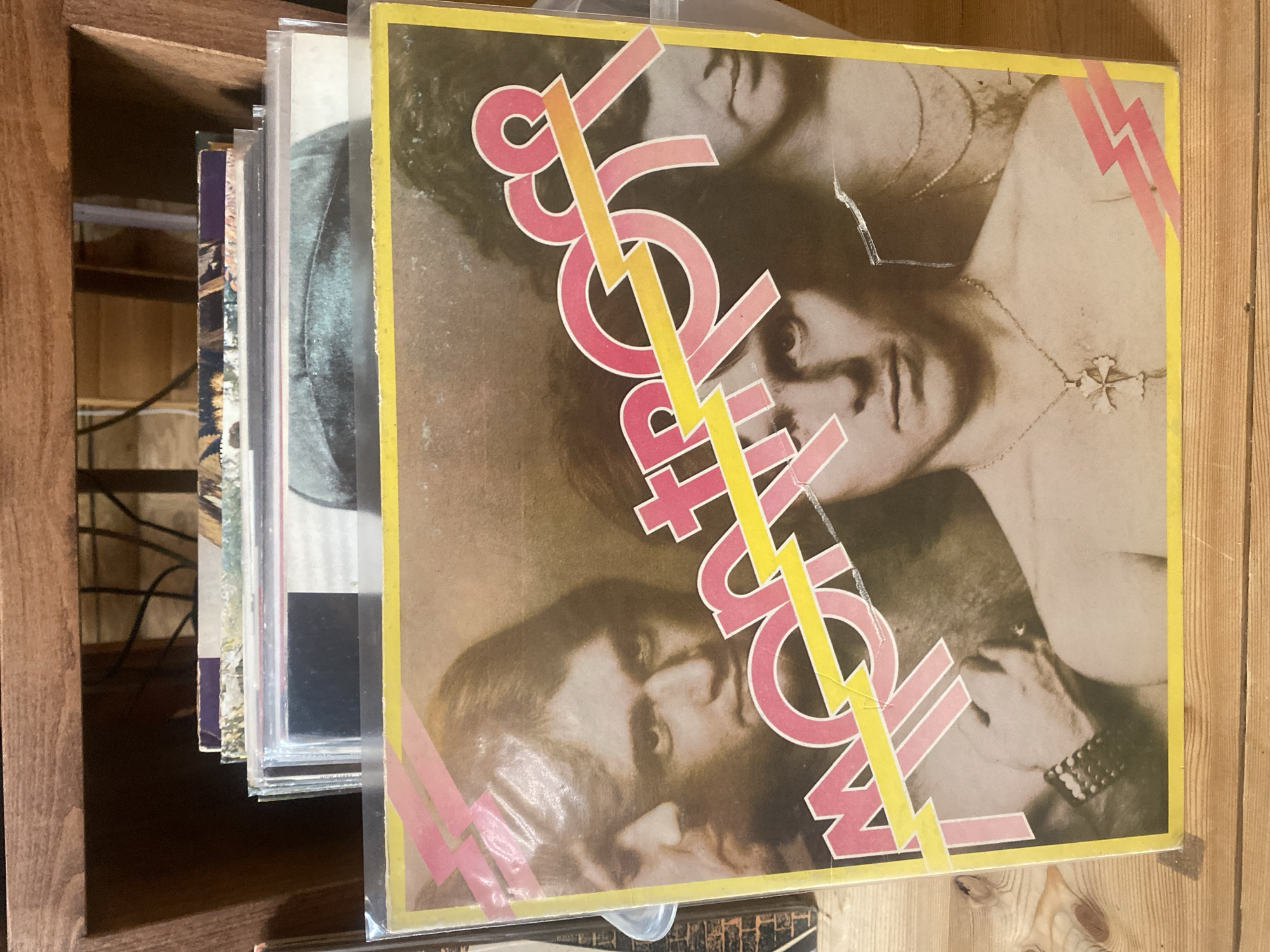 Vinyl record collection browsing session in rural Russia