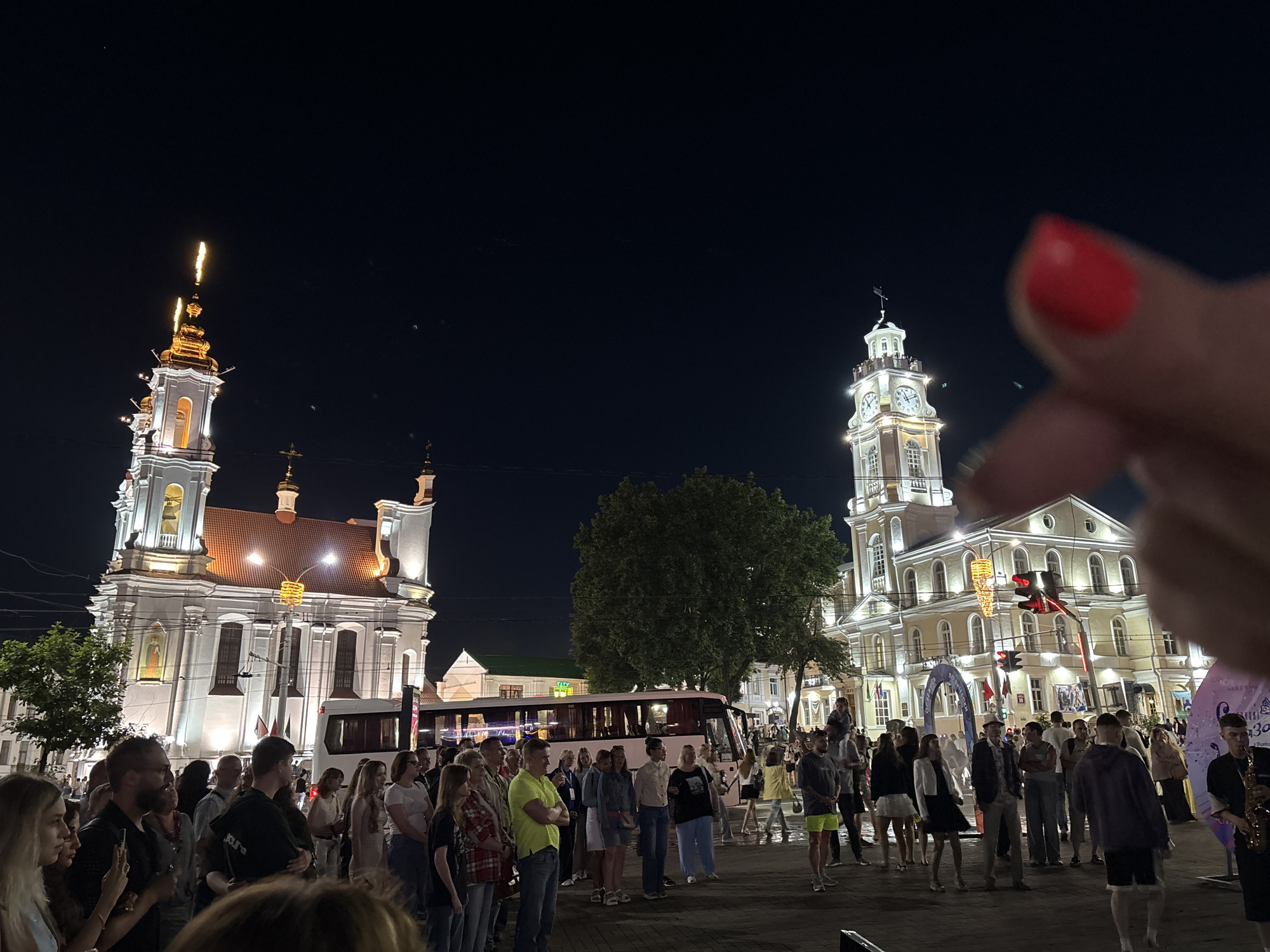 Summer night out in Vitebsk city center, crowds filling the squares