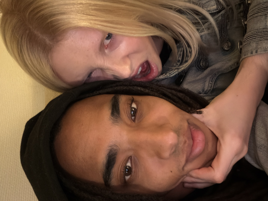 Two people photographed together indoors in Paris