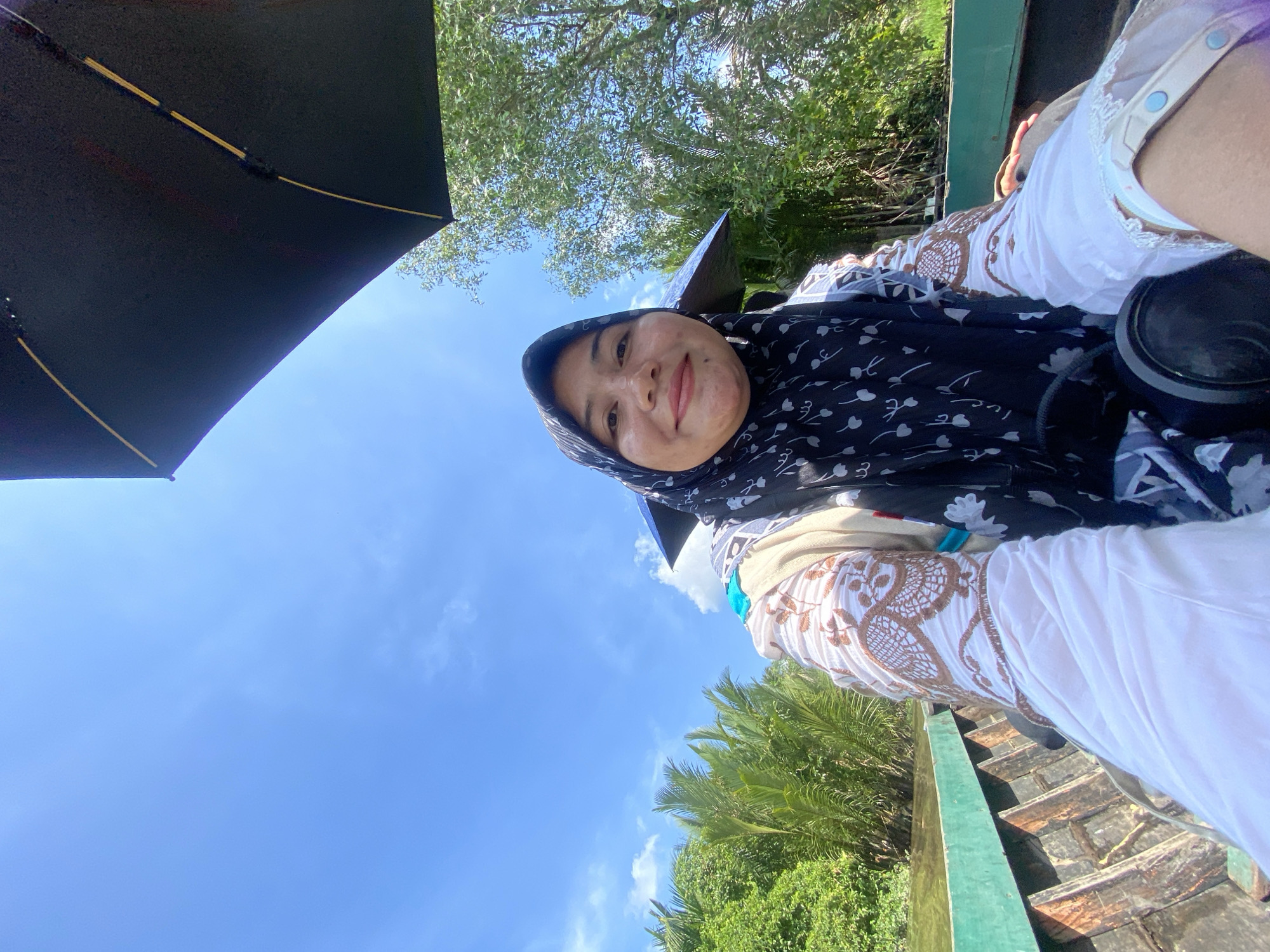 Boat ride along a river in Banjarmasin, Indonesia