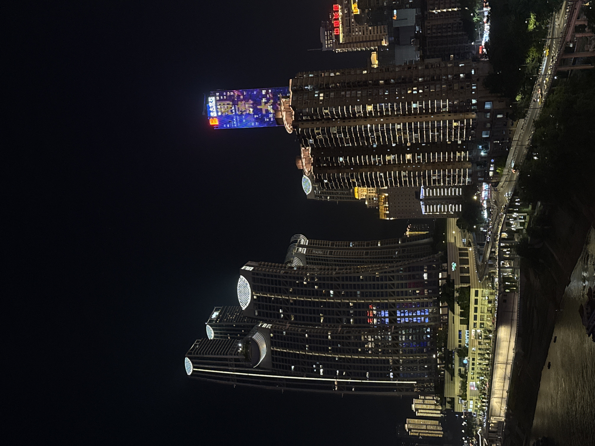 Evening tourist activities documented in Chongqing's Yuzhong District