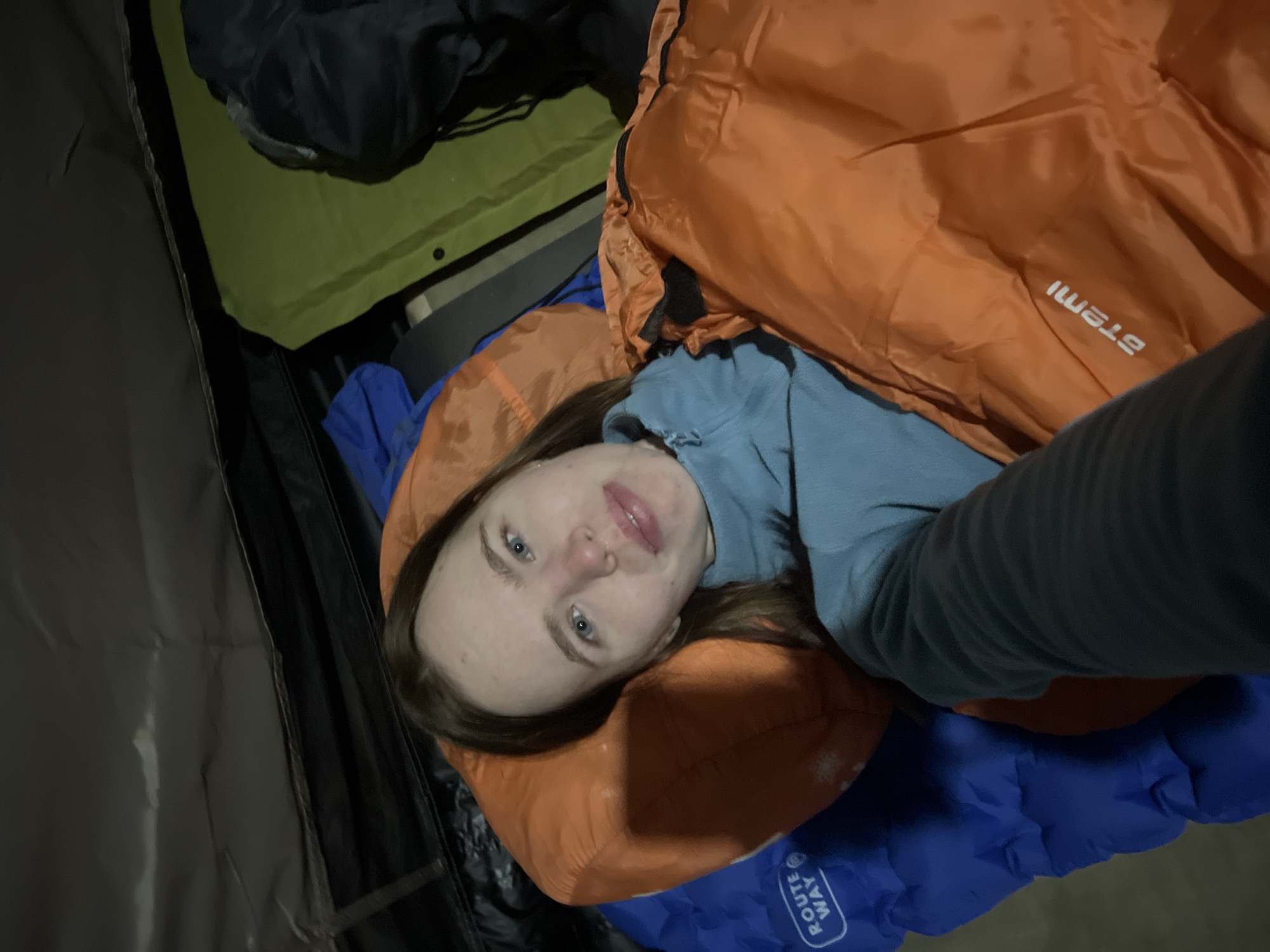 Woman takes tent selfie during camping trip in Russia