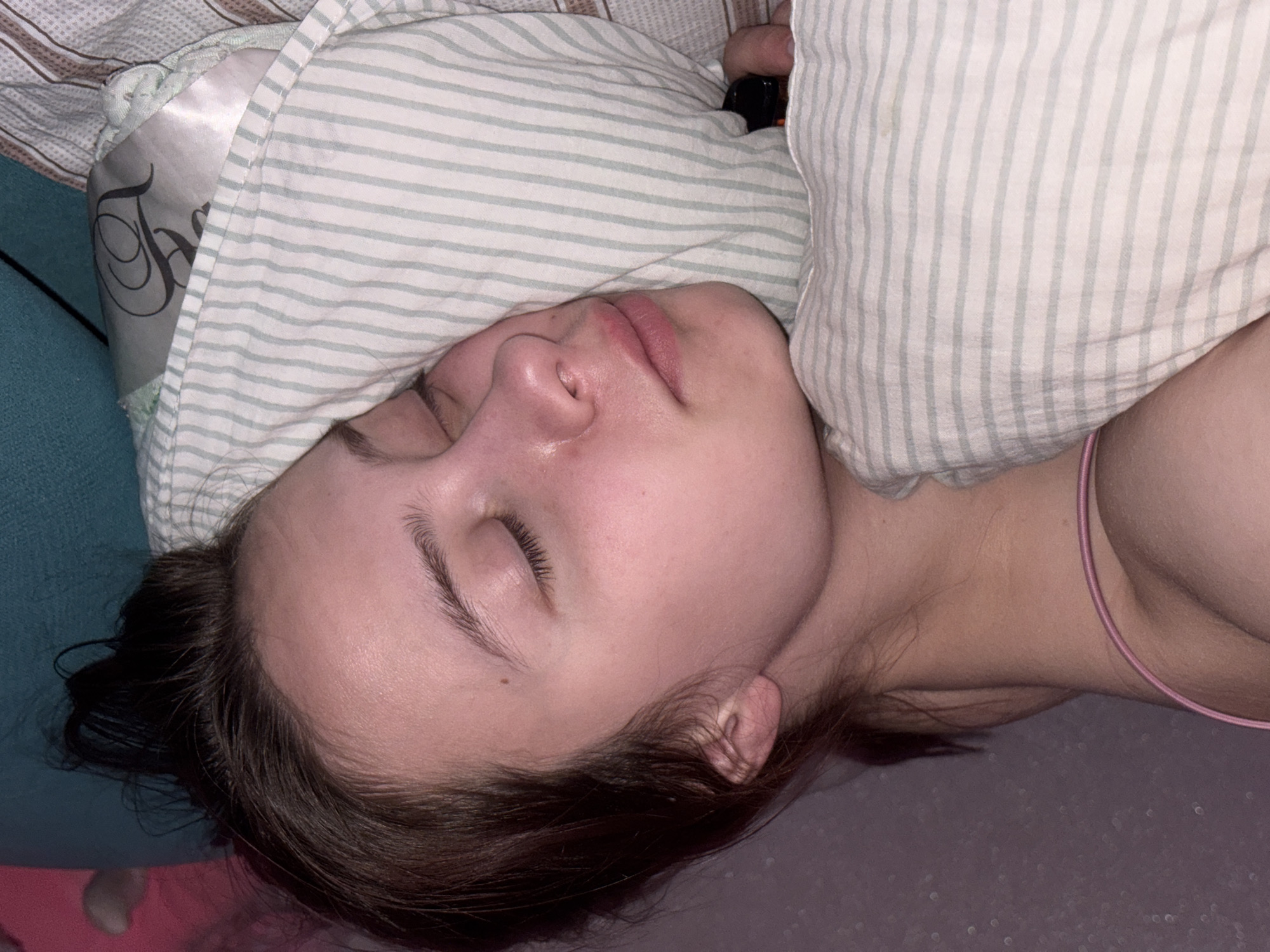 Person sleeps peacefully in bed in Russian town