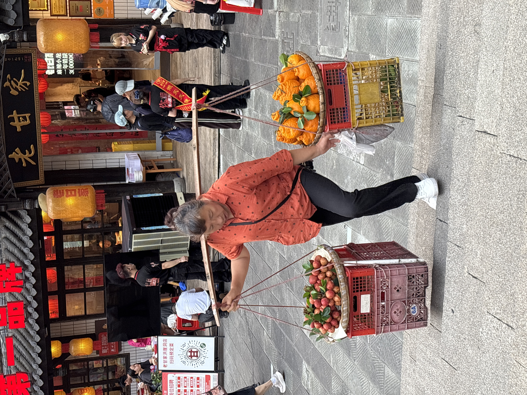Daily life unfolds across Yuzhong District streets and riverfront