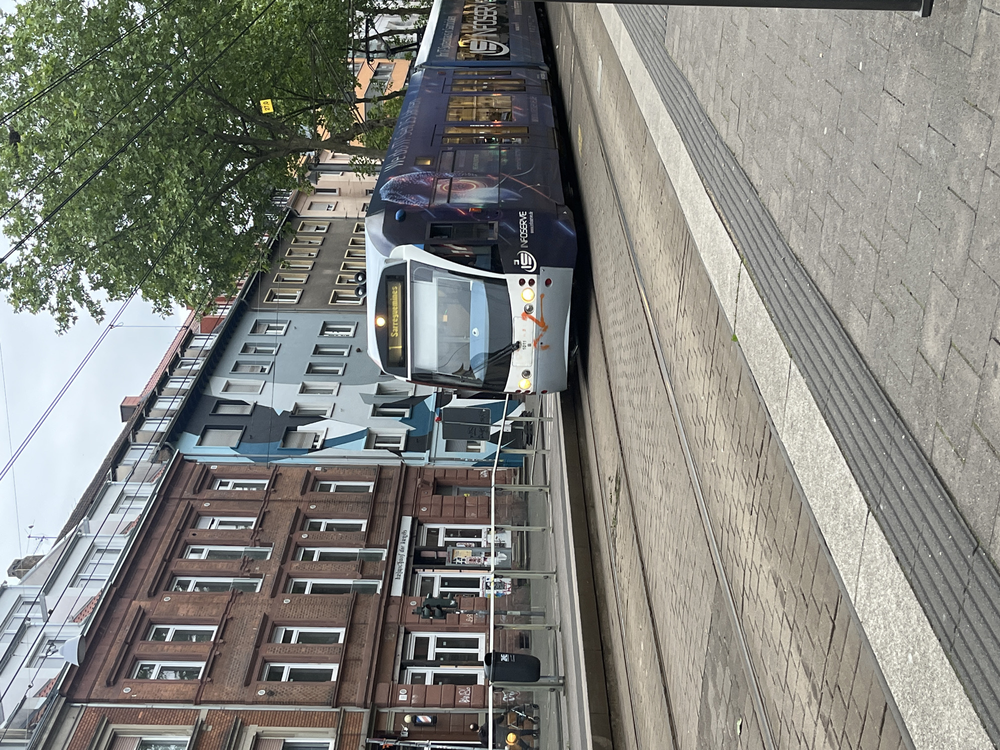 Ordinary Tuesday afternoon captured: tram service and gym activity