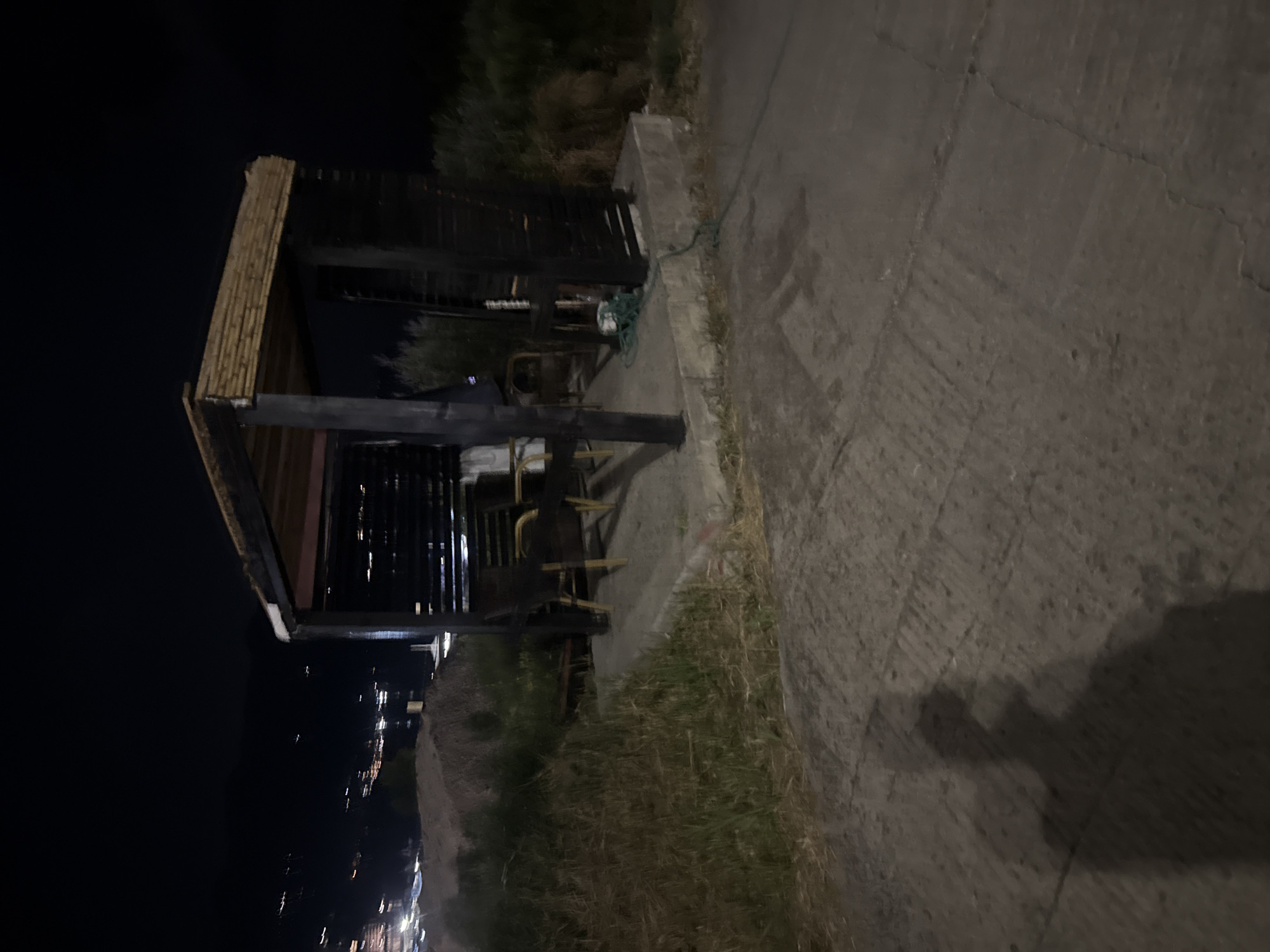 Boreti after dark: waterfront, streets, and mountain views