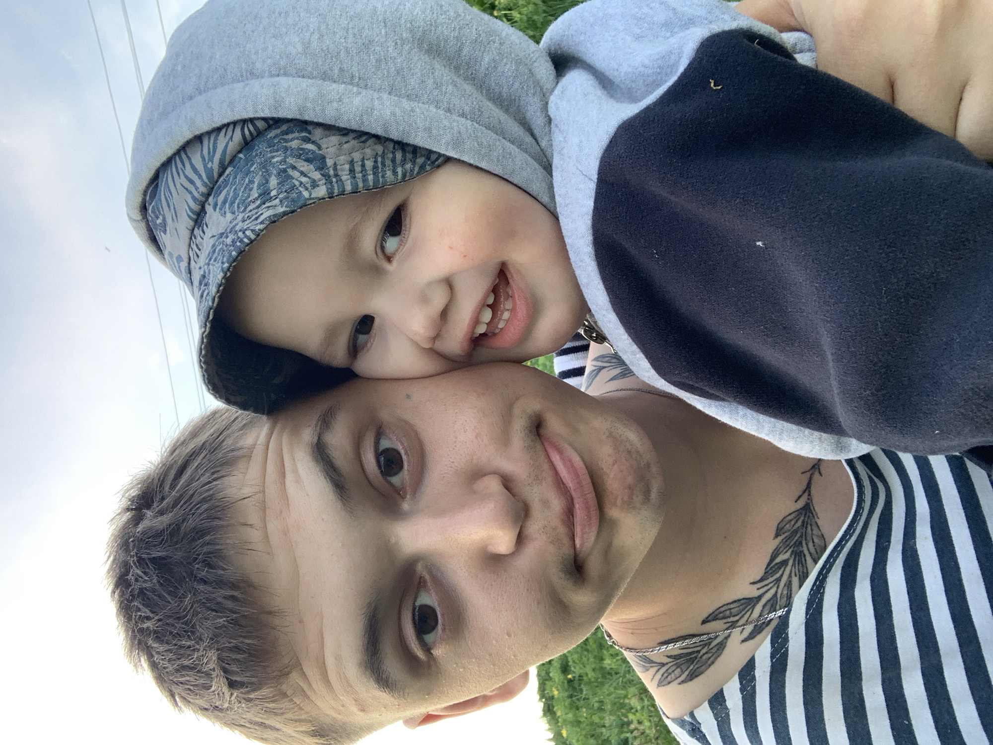 Father and child photographed during outdoor afternoon in Фоки, Russia