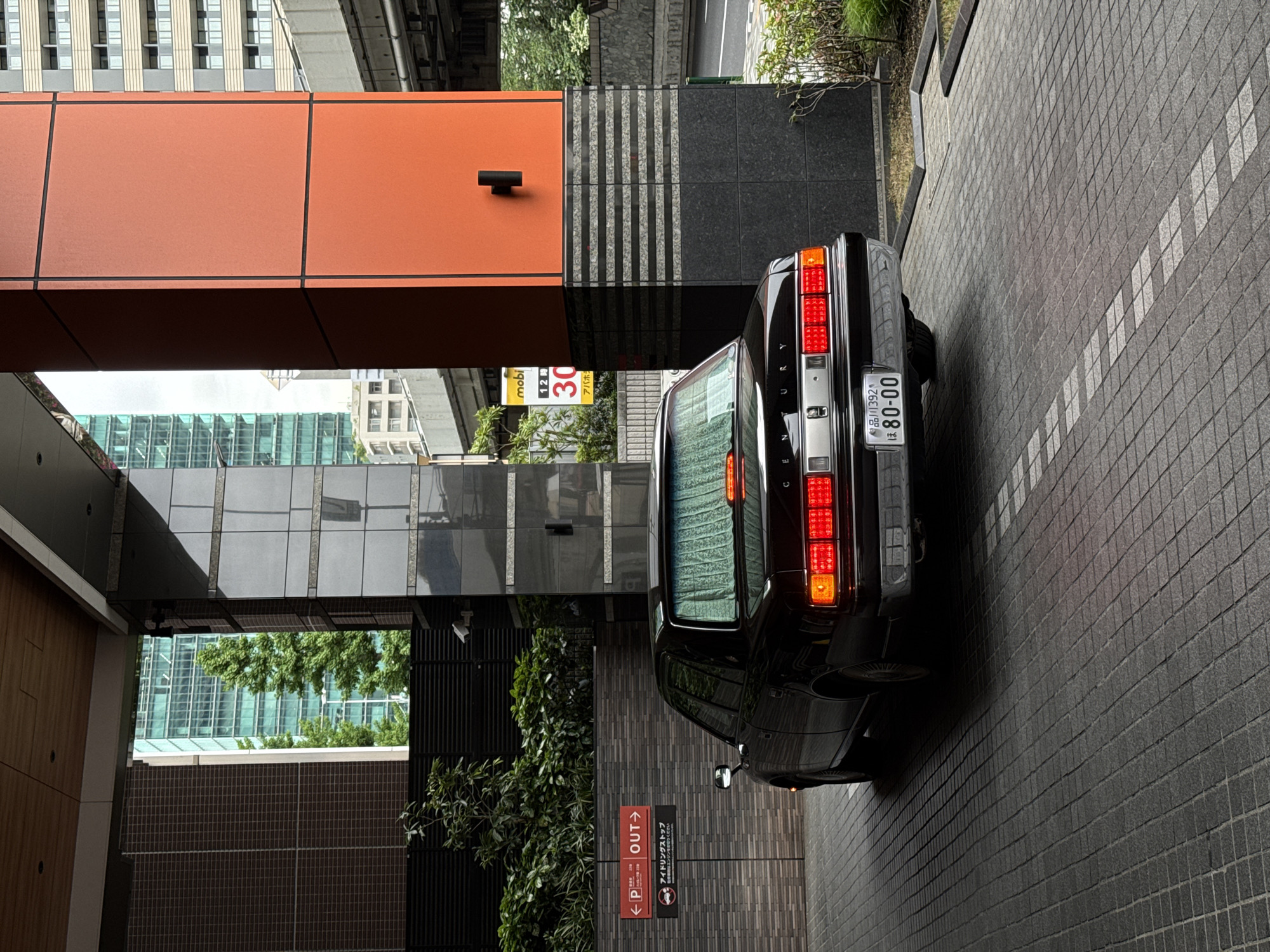 Black vehicles including luxury sedan observed on Minato streets