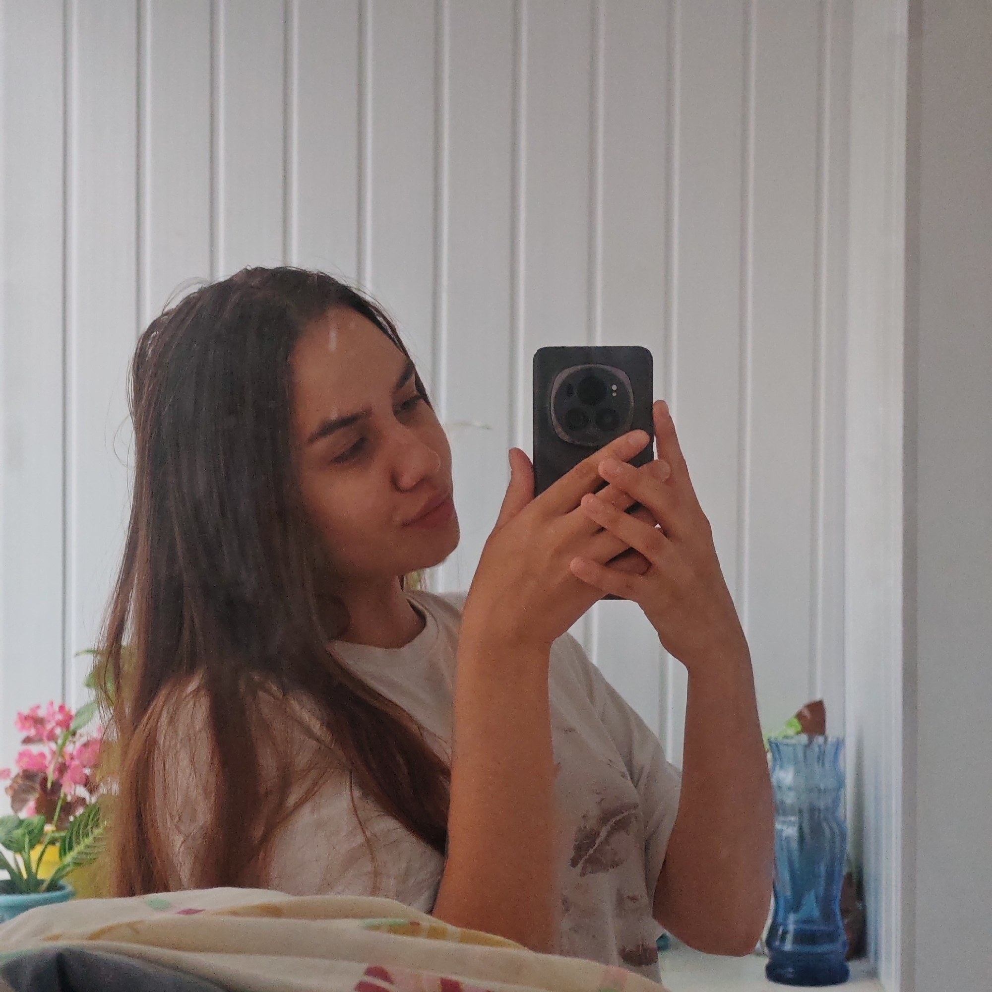 Apartment life: plants, selfies, and a forest view